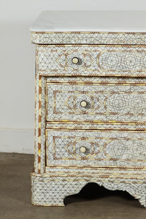 Fabulous Middle Eastern Syrian art work, handcrafted white wedding dresser with three drawers, walnut inlay with mother-of-pearl, shell, ebony and bone. Moorish arches and intricate Islamic designs. Dowry chest of drawers heavily inlaid in front,