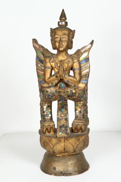 Paire de statues Kinnari dorées thaïlandaises