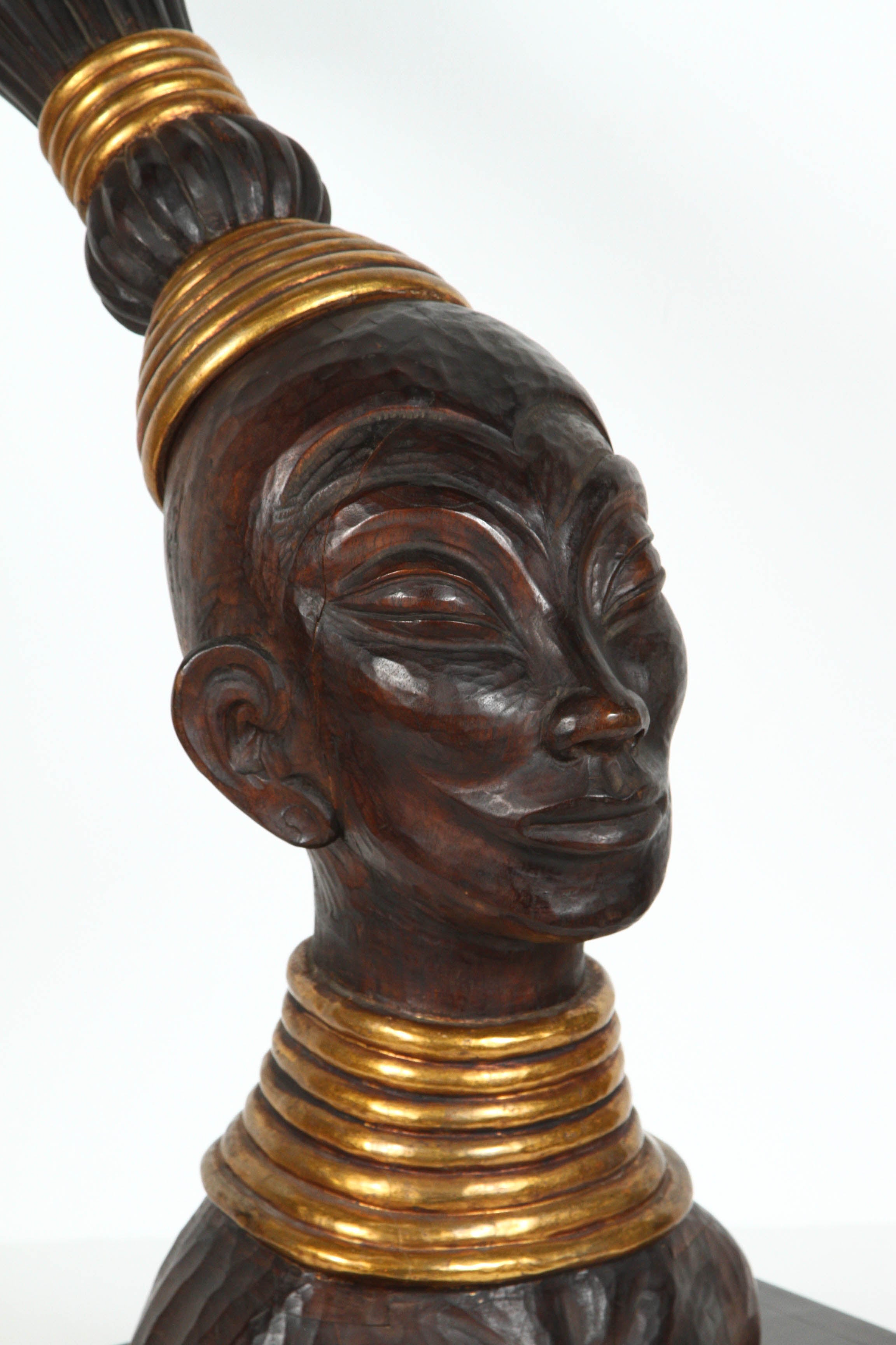 Hand-carved tribal wooden Zulu African head, very nicely carved with gold embellished jewelry and traditional hair style and gold head dress.
Large contemporary bust sculpture 30