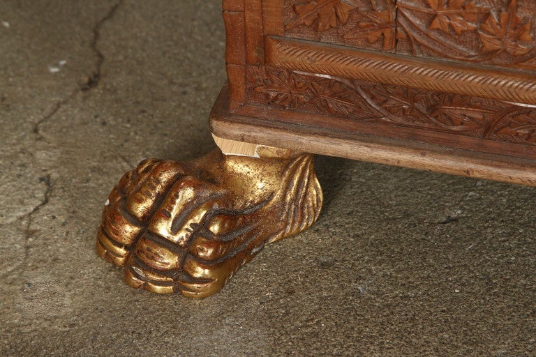 Very special and unique, fabulous Indonesian sideboard, great quality and very fine hand-carved chest of three drawers with two doors.
Very interesting work, Anglo-Indian style flower designs all-over sitting on four gilded claw feet. Handmade