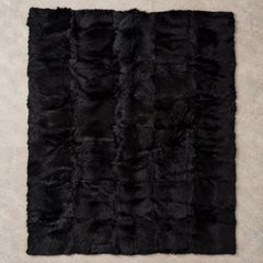 Alfombra «Alps» de Minotti, de piel de oveja neozelandesa negra, diseño moderno italiano