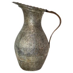 Cruche persane du XIXe siècle, de l'époque Qajar, en cuivre étamé gravé