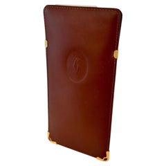 Etui à lunettes en cuir bourgogne de Cartier fabriqué en France années 1980