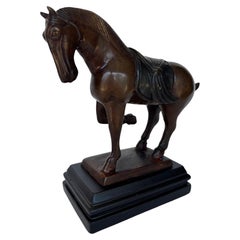Vintage Cast Bronze Saddled Horse Sculpture with Dark Patina on Black Base