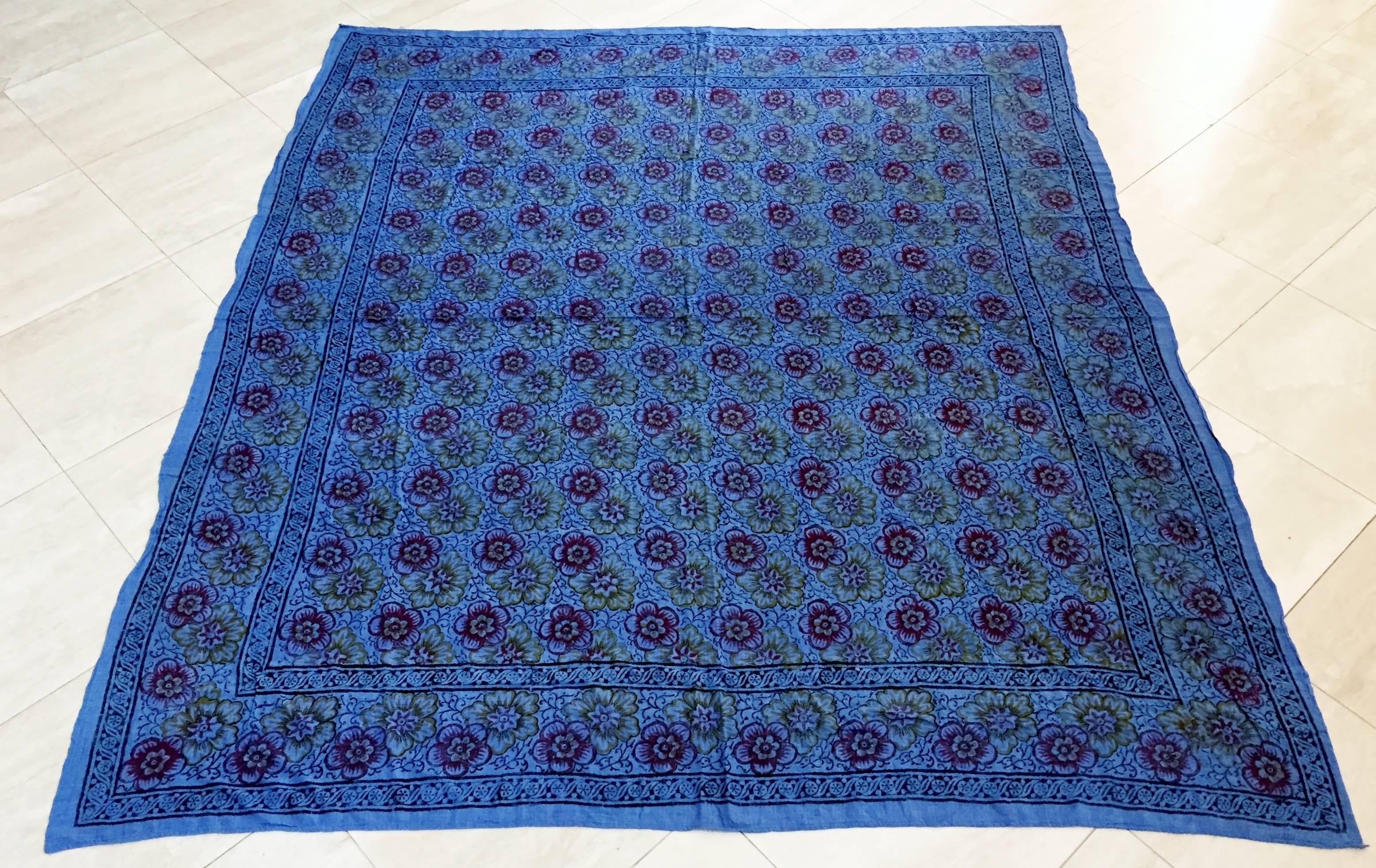 Vintage Kalamkari blue with flowers textile from India.
Hand blocked vegetable and iron oxide dyes on cotton.
The fabric is printed using patterned wooden stamps.
Made in India, circa 1970
Qalamkari literally “pen-workmanship,” are block-printed