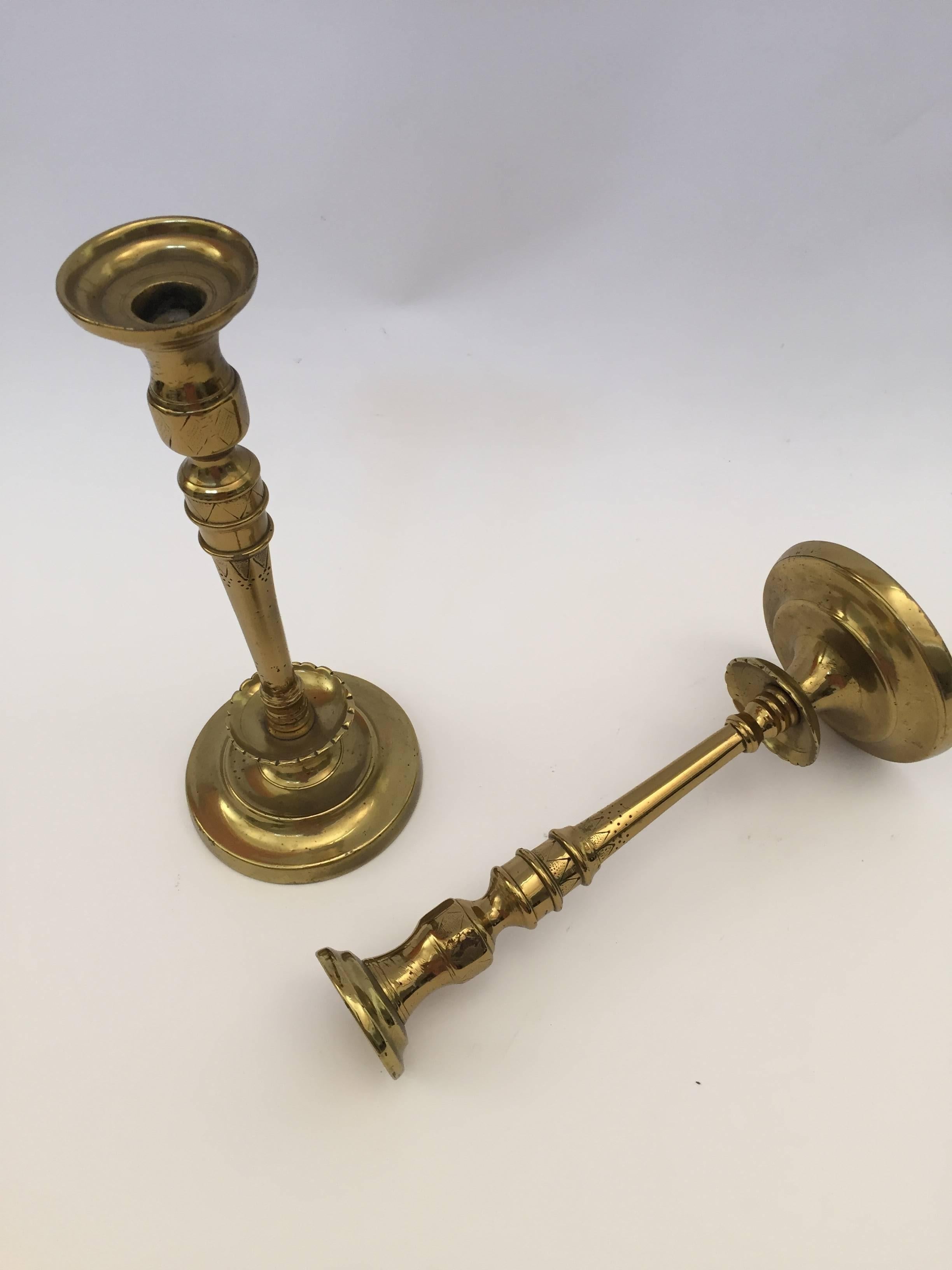 Pair of French 19th C. hand-tooled brass candlesticks.
Size: 12