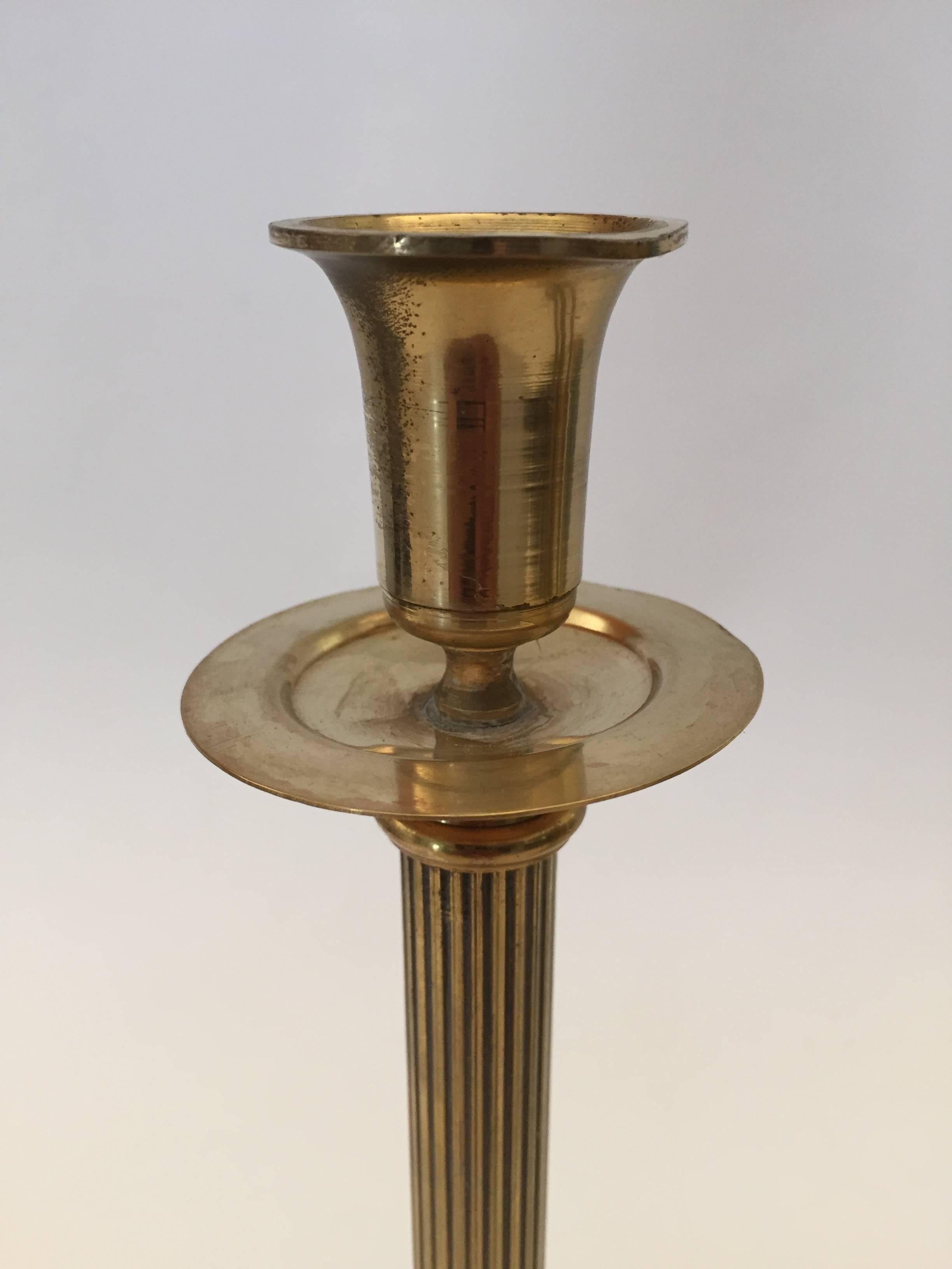 Polished Set of Four Victorian Brass Candlesticks