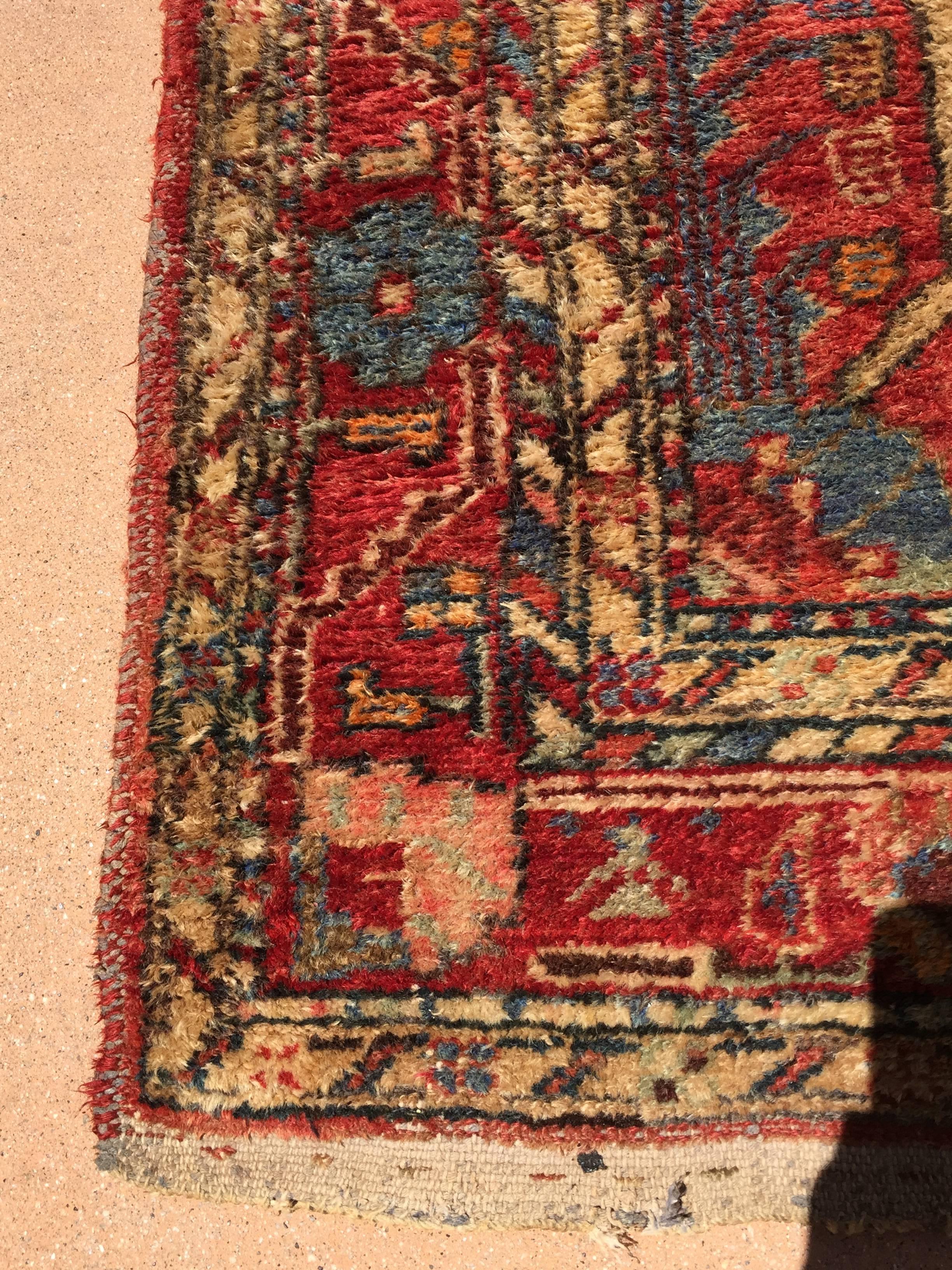 Small hand-knotted rug from Eastern Turkey,
circa 1940.
Size: 3ft 9 in x 6ft 5in.
Traditional Turkish design and colors.
Small pile rug.
