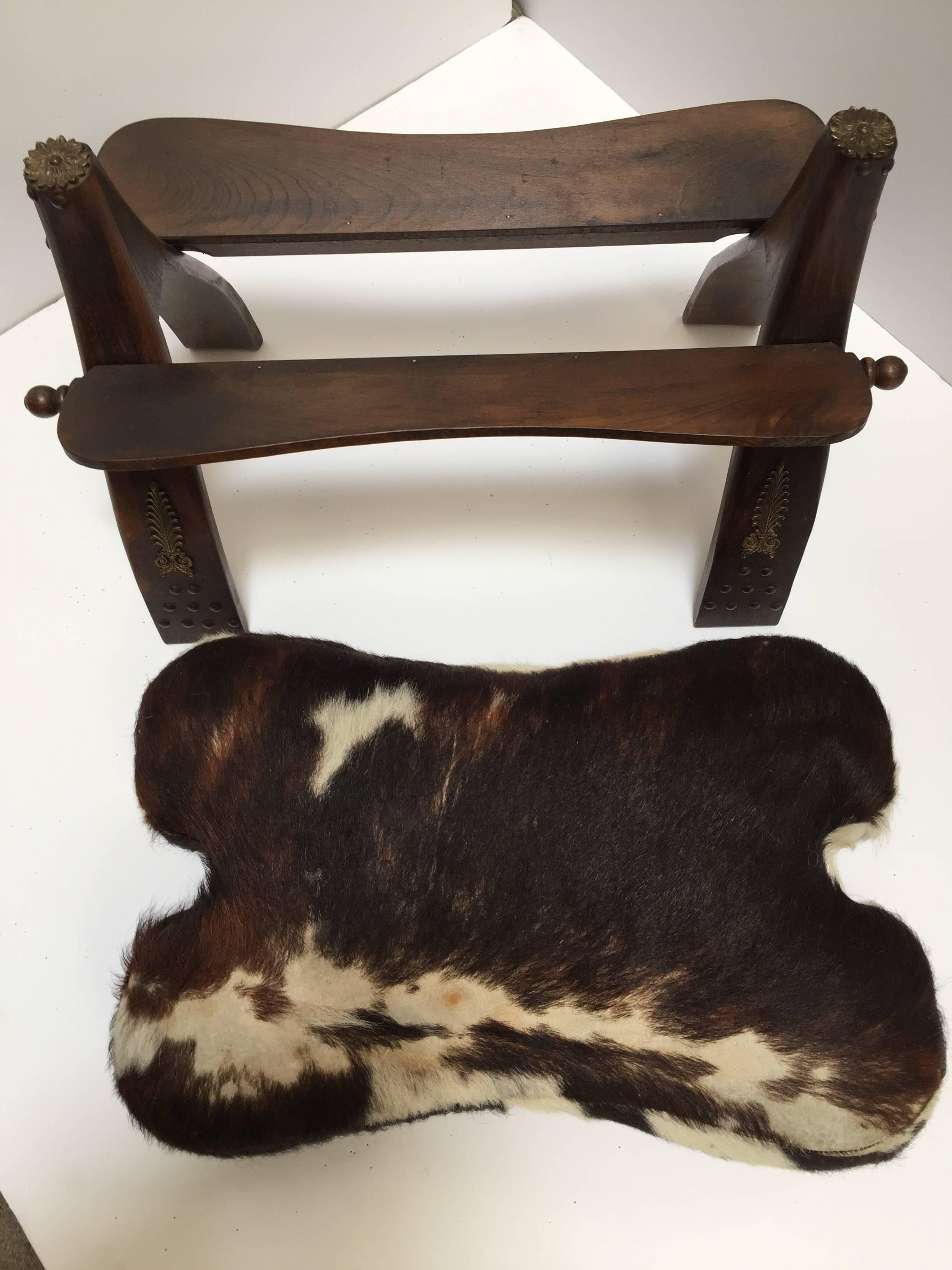Pair of Camel Saddle Seat Footstools with Cowhide Cushions 2