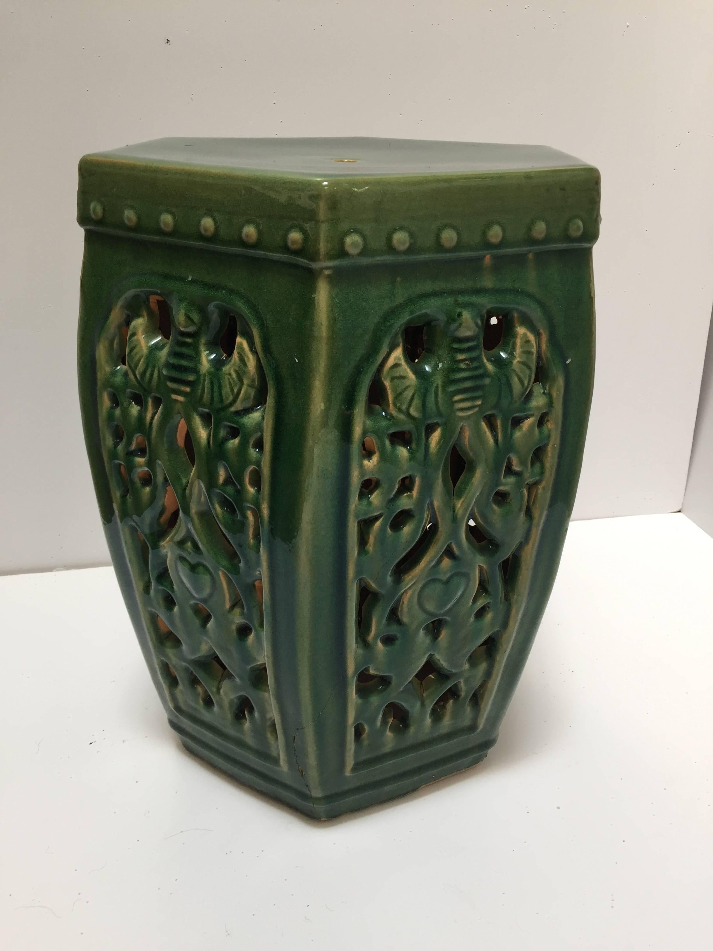Great color, emerald green Chinese ceramic garden stool.
Asian ceramic seat in hexagonal shape, nicely carved on each sides.
Great to use indoor or outdoor as a stool, end table, or plant stand.
Asian ceramic garden furniture, light, easy to carry