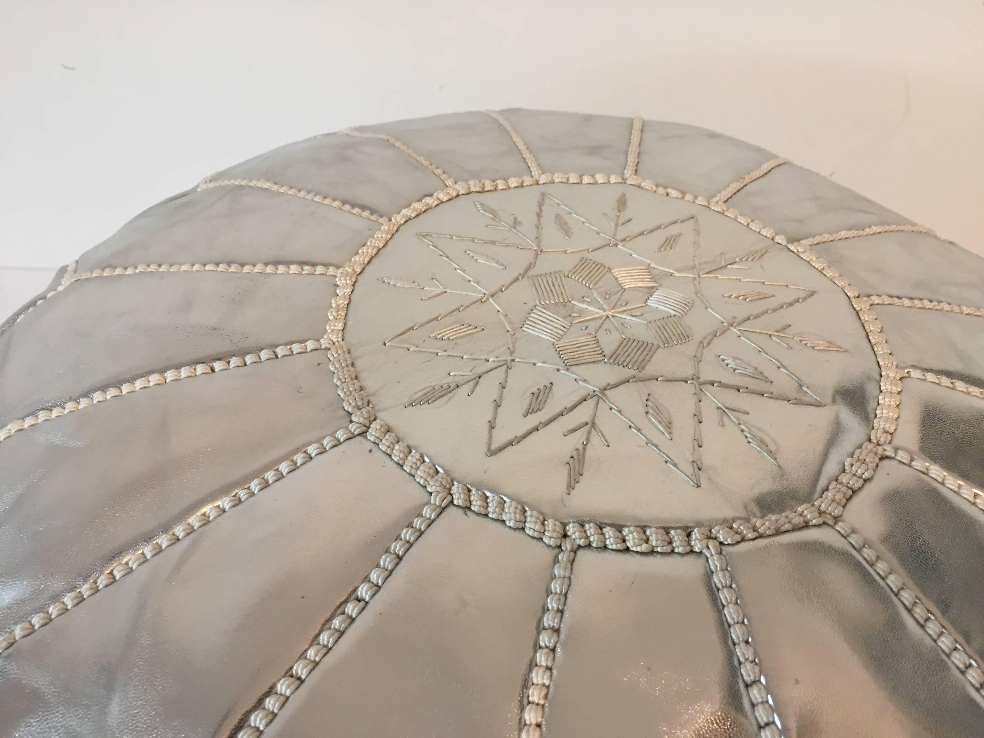 Faux Leather Moroccan Silver Hand Tooled Round Pouf Ottoman For Sale