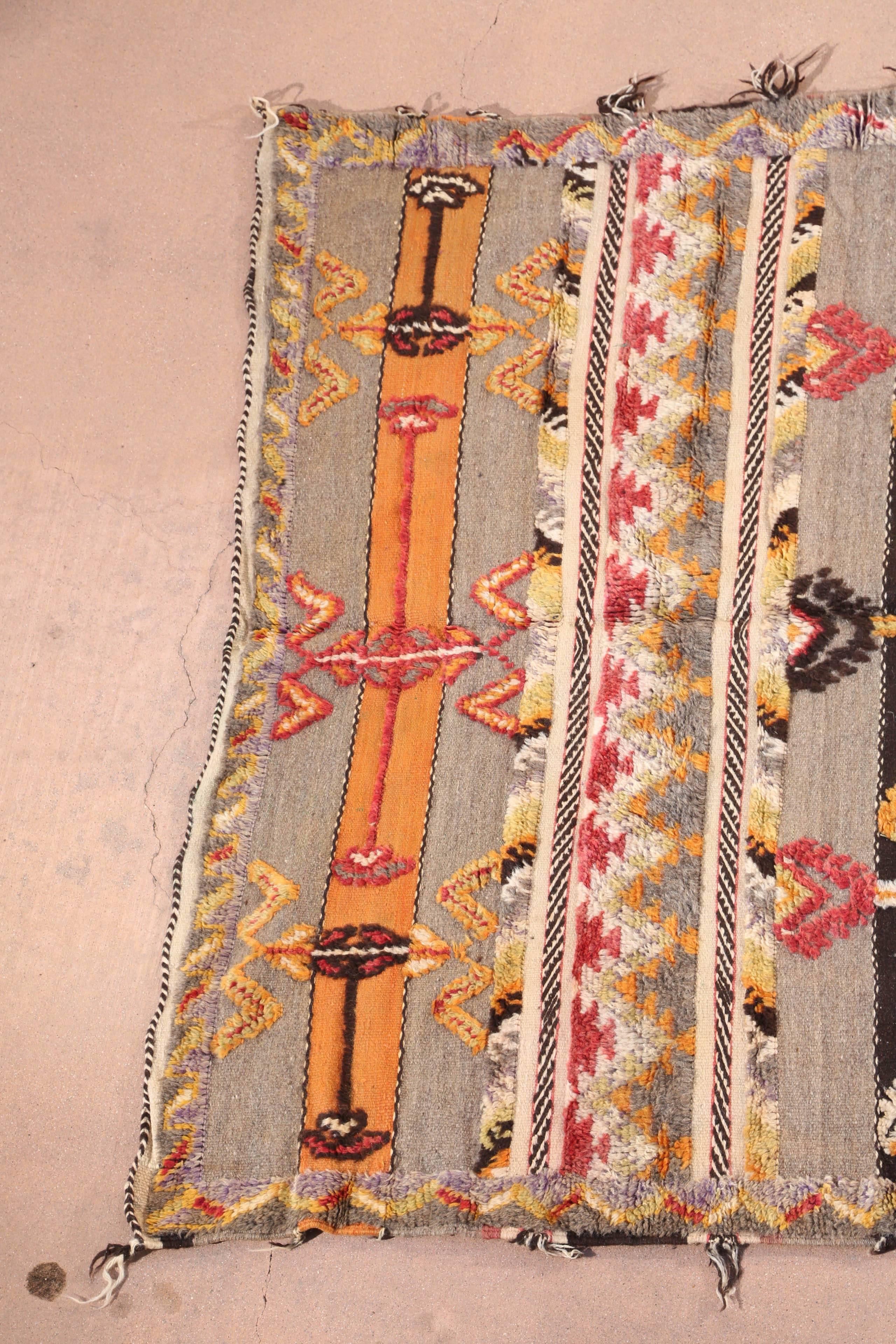 Midcentury Moroccan vintage tribal rug handwoven by Berber women in Morocco.
 