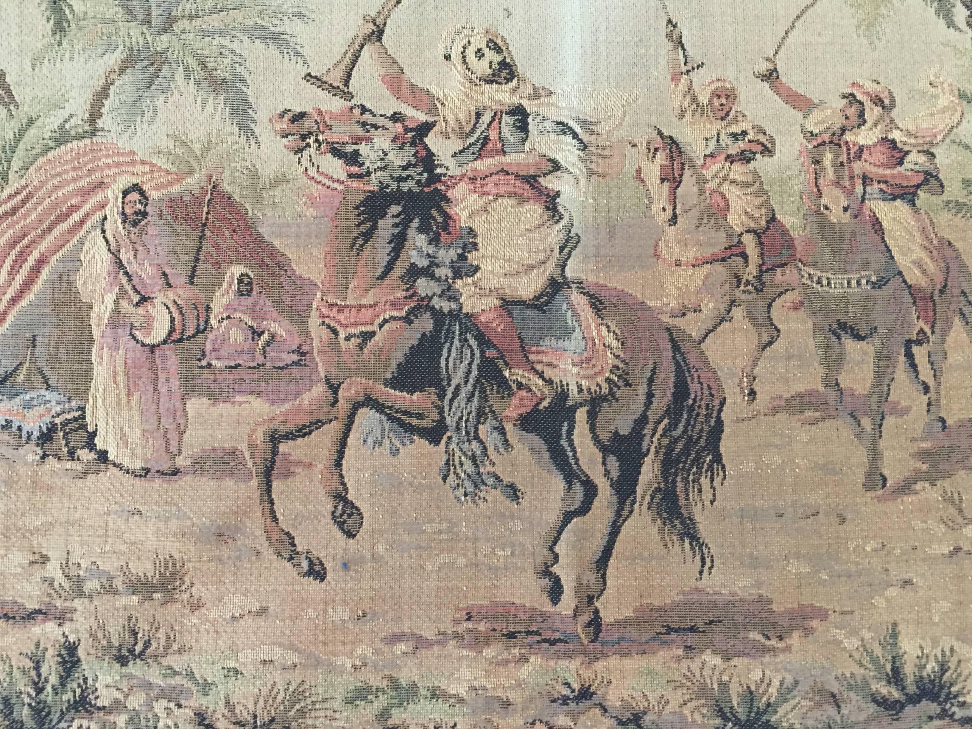 Wool tapestry with orientalist Arab on horse hunting scene, brown antique look colors.
Textile with Berber Nomadic tent in the background and Middle Eastern musicians.
Aubusson tapestry style, circa 1940 made in France stamped in the
