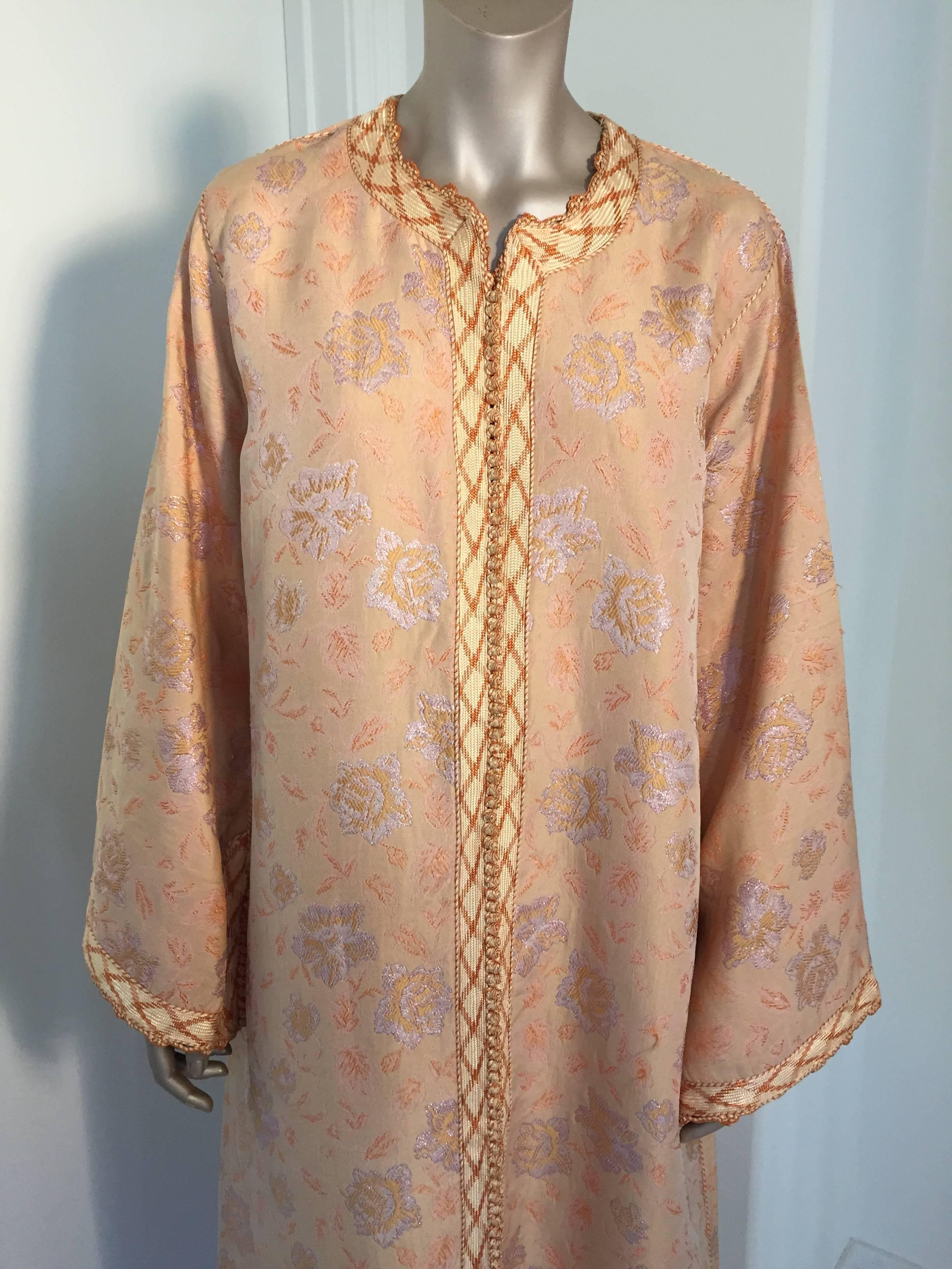 Elegant exotic Moroccan brocade caftan vintage maxi dress gown, circa 1970s.
This long maxi dress kaftan is  embellished entirely by hand.
One of a kind evening Moroccan Middle Eastern brocade gown.
The kaftan features a traditional neckline,