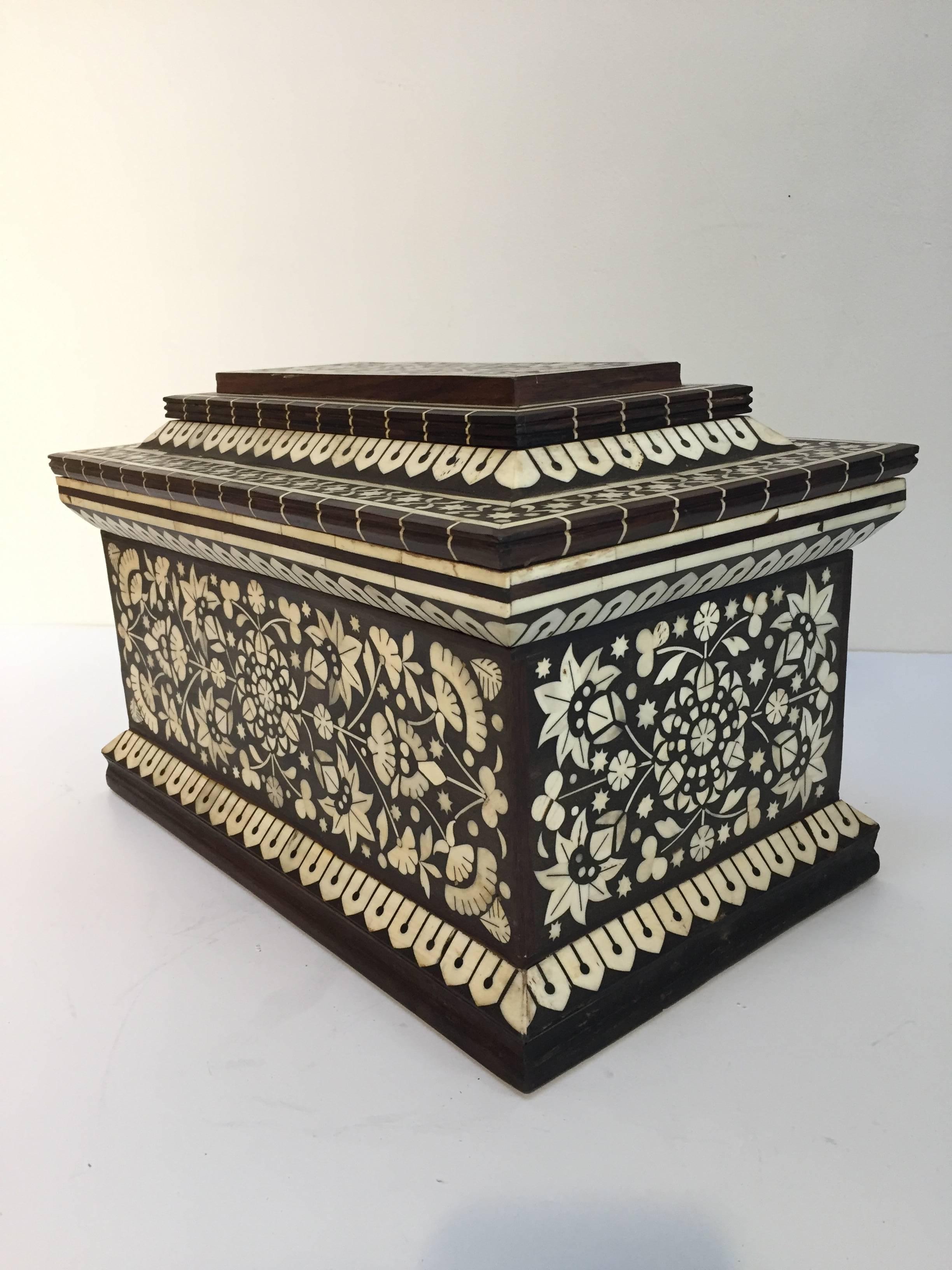 Fabulous Anglo-Indian decorative chest inlaid with bone.
Made in Vizagapatam, situated on the south east coast of India, near Madras
Sandalwood Horn Inlaid with vine flowers surround the top and base.
These exotic box pieces were crafted with