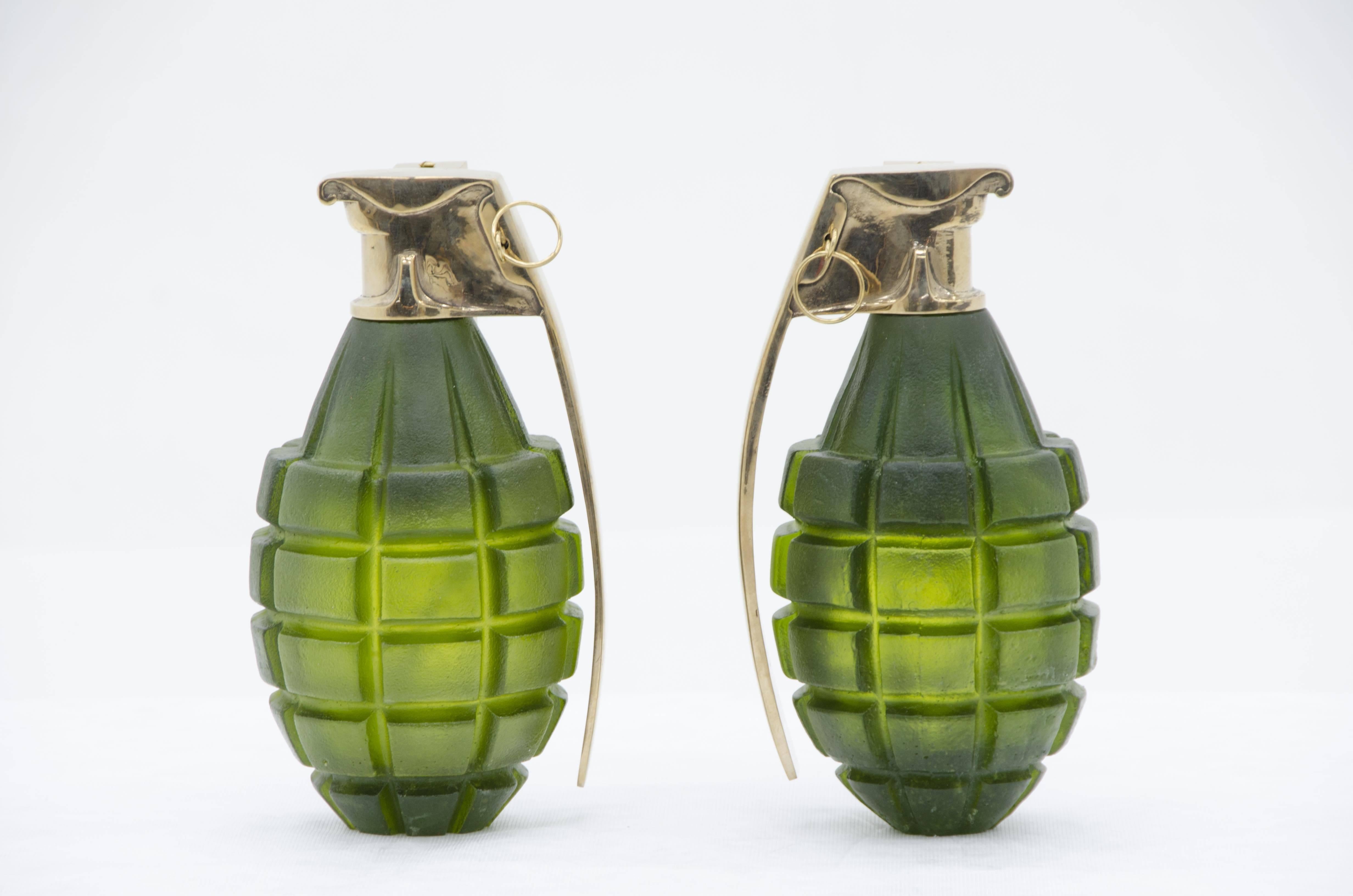 Pair of grenade sconces by Stan Usel, green molten glass.