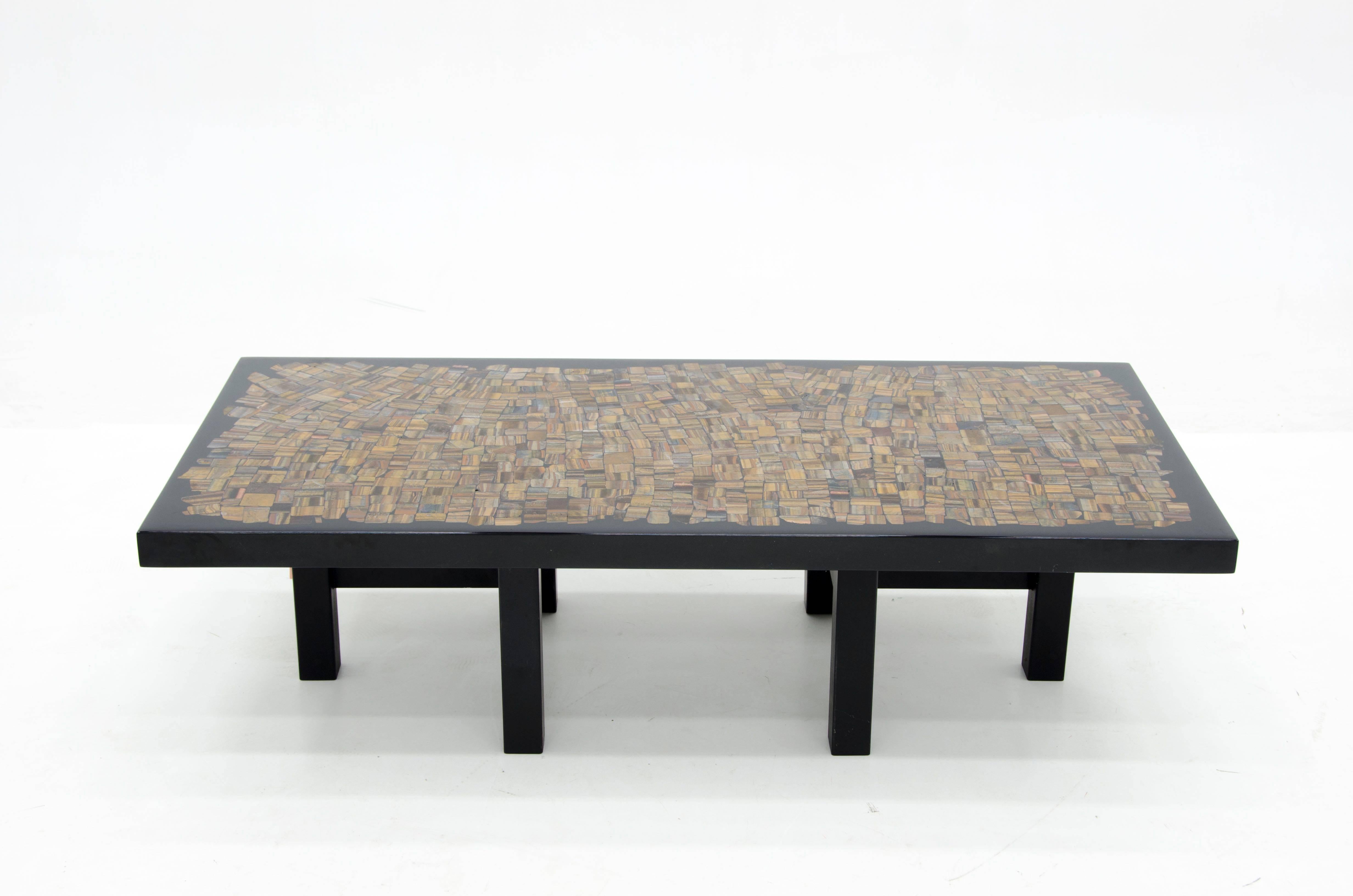 Coffee table by Etienne Allemeersch in black resin inlay of tiger eyes, signed by the artist.