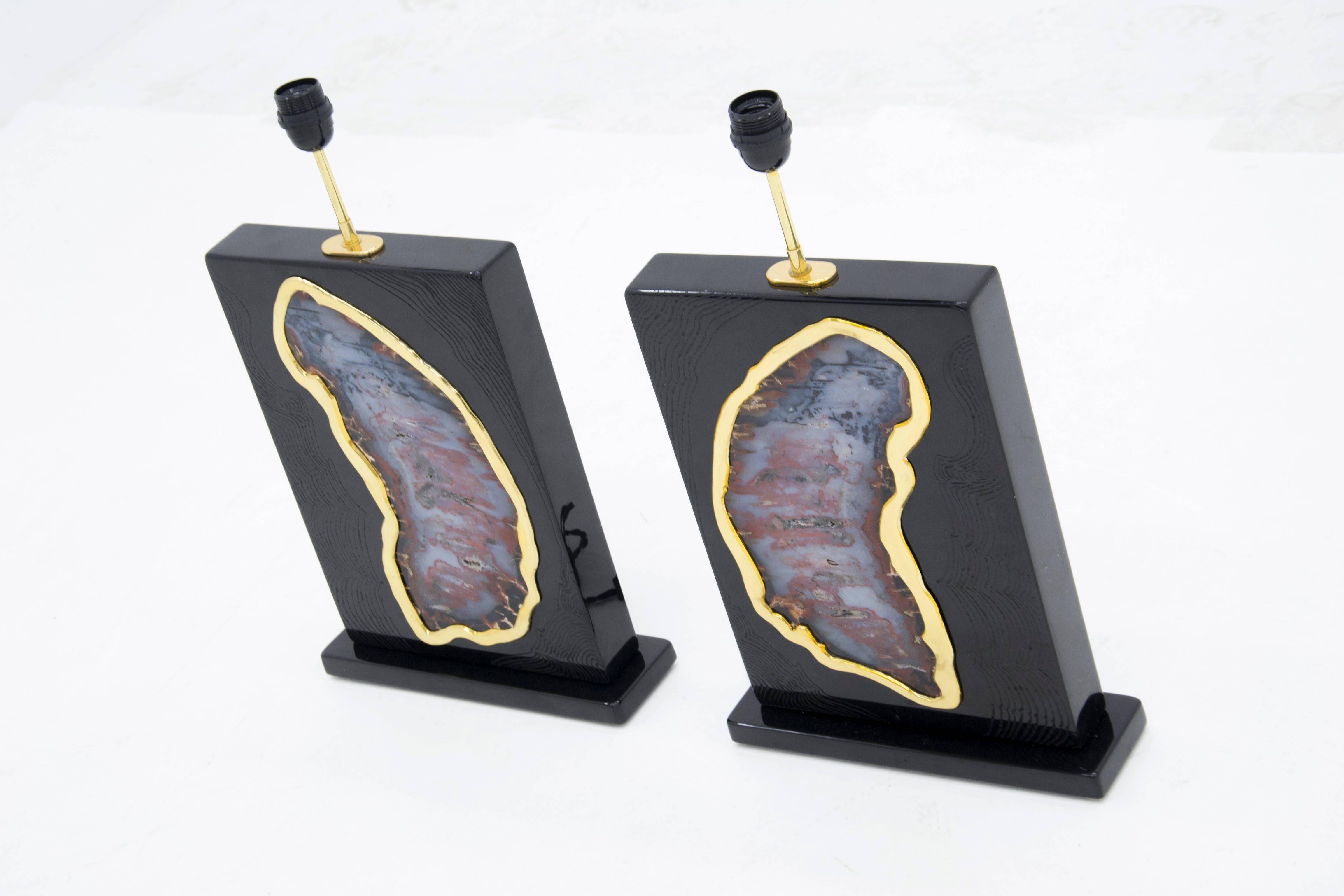 One of a kind studio built pair of lamps in black resin inlaid agate by Stan Usel.
These pieces are made exclusively and distributed in USA for Saint Germain antiques. Exceptional craftsmanship. All pieces can be custom-made to order. Signed by the