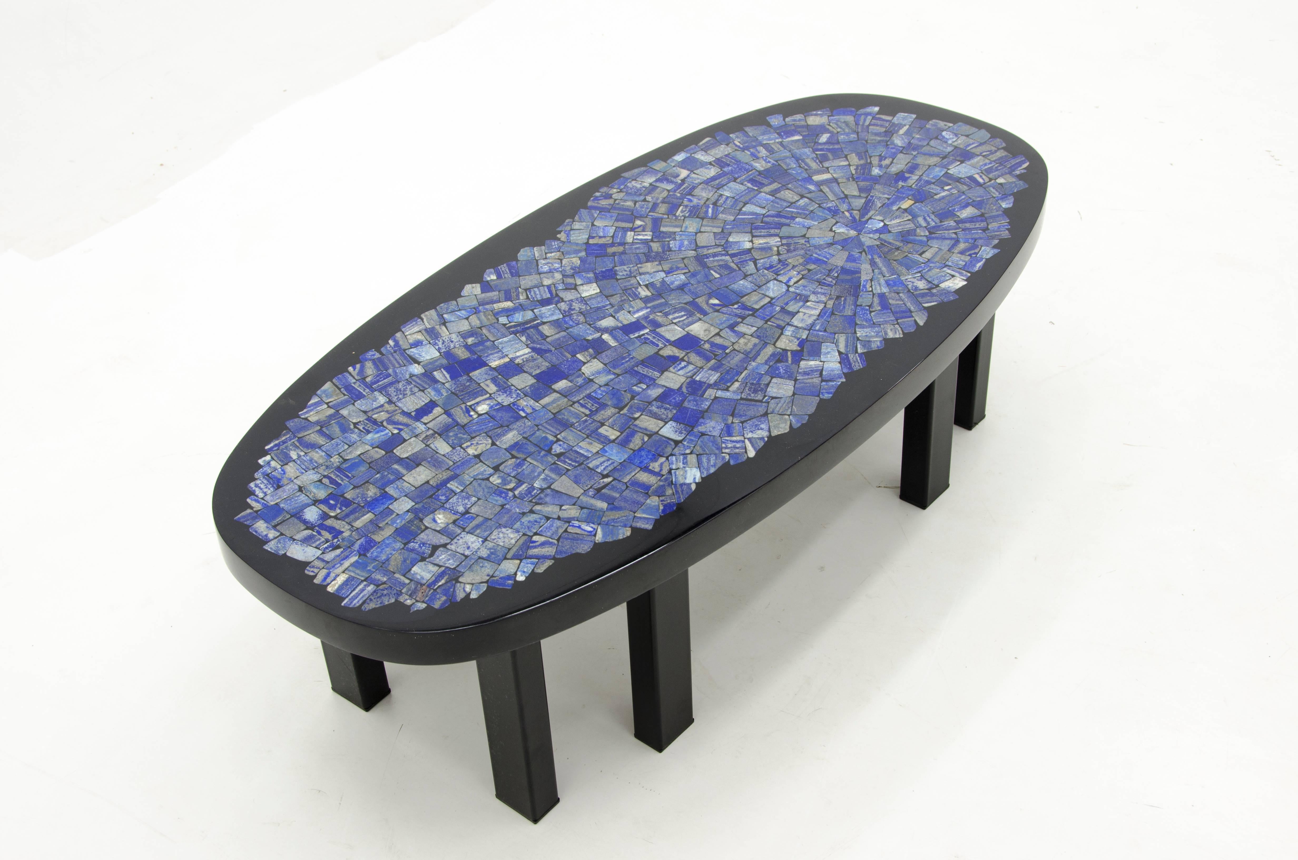 Wonderful coffee table in black resin inlay of Lapis Lazuli by Etienne Allemeersch,
circa 1980, signed by the artist, in very good condition.