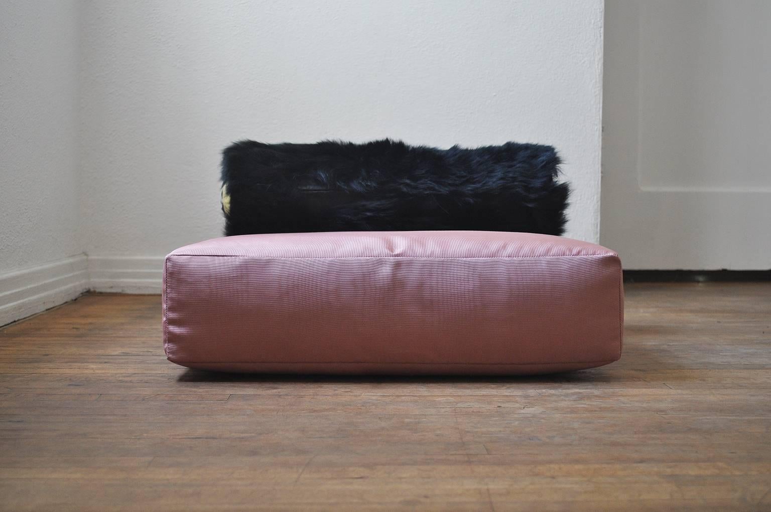 Yaoska Davila’s floor cushions are functional and elegant. Inspired by the opulence of the 1920s and 1930s. Designed for intimate adventures that occur on the floor. Each set is one of a kind just like you. Bolster sits separately from the cushion