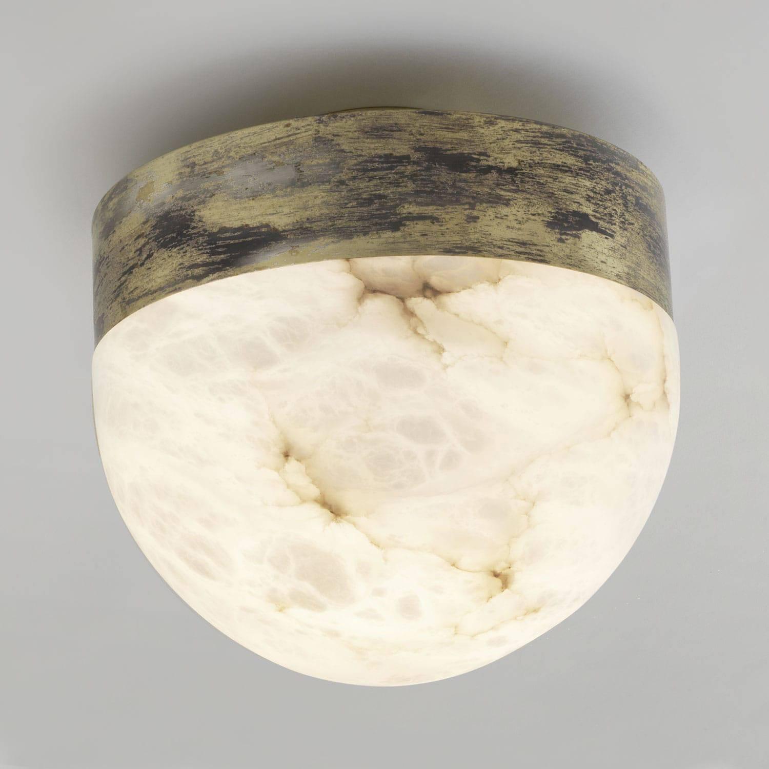 The lucid light consists of honed alabaster and oxidized silvered brass base. Quantities available. Additional options available: ceiling flush mount in two sizes, ceiling pendant, table lamp in two sizes and wall mount. Bespoke also available.