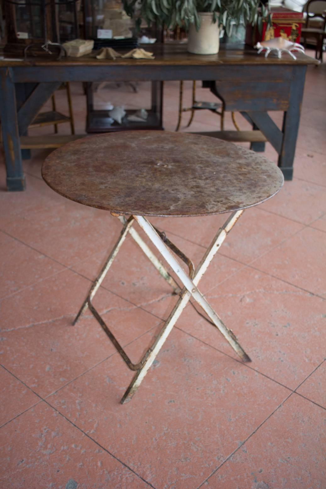 Antique French metal folding garden or bistro table. The table has been sealed to retain its gorgeous patina!
