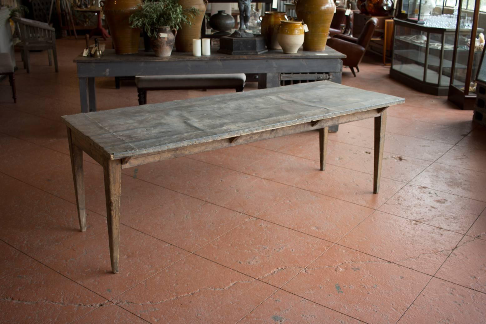 Antique zinc top potting table with pencil legs. Great patina!