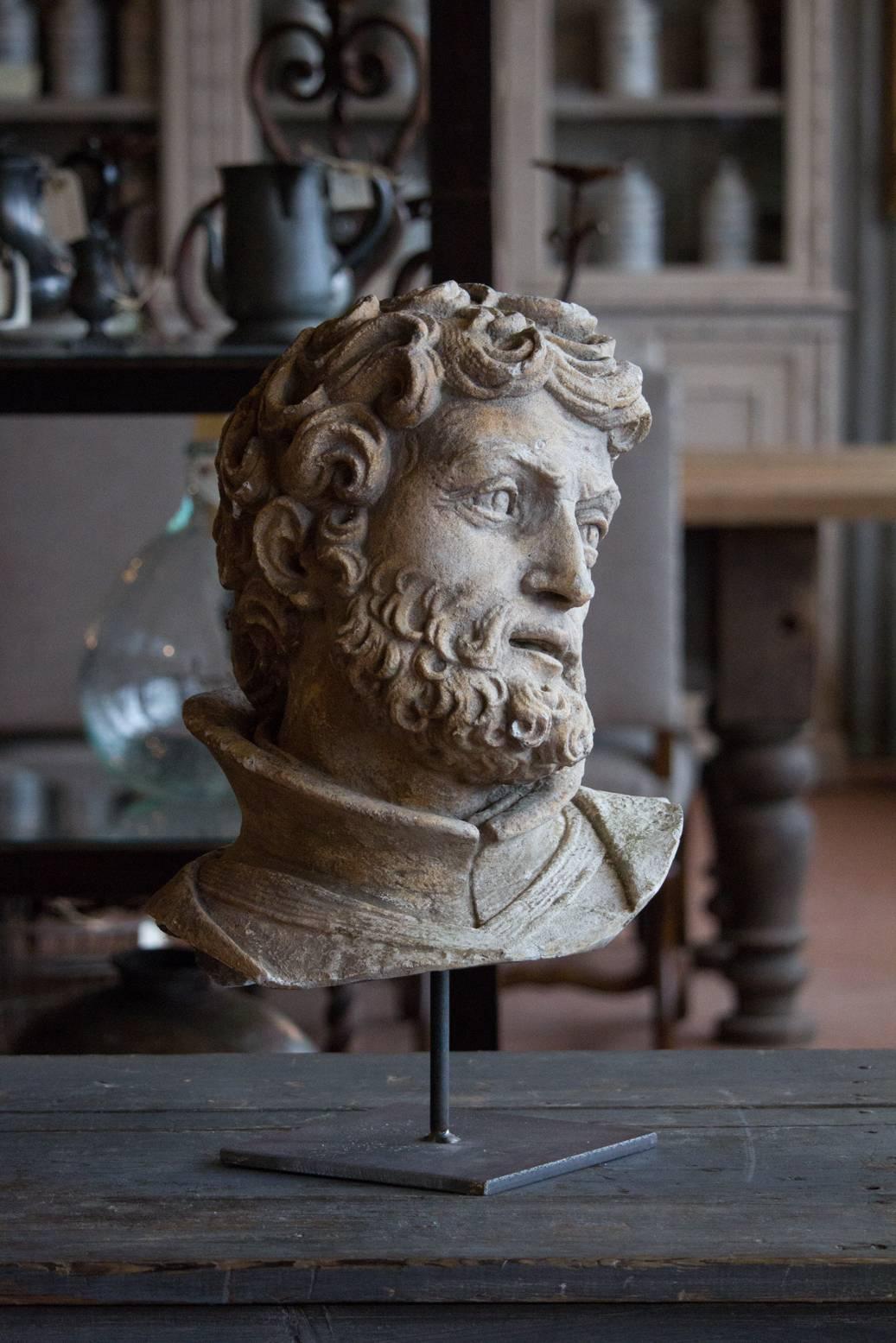 We believe this wonderful plaster bust to be in the period style of the Tudor or Elizabethan period given the style of the high collar, however, we are unable to identify who he is. It has a beautiful form and patina that has been mounted on a