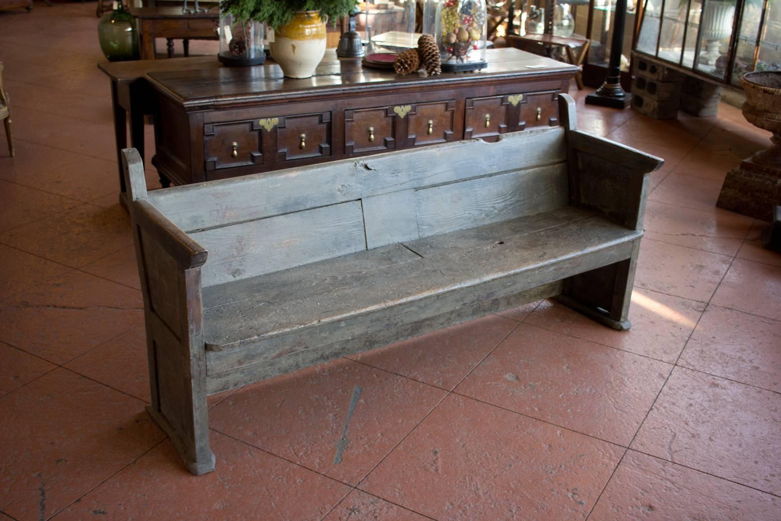 Rare 18th century rustic Spanish bench from the Catalonia area, with original paint. Wonderful shape and patina.

The height of the back is 28 inches and with the finials is 33 inches.