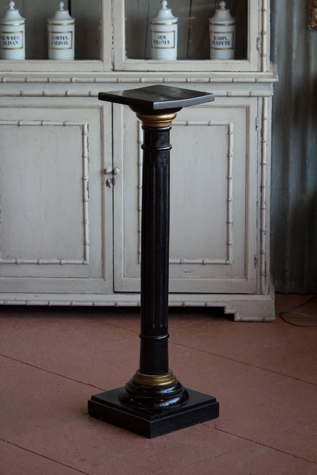 Vintage English ebonized and gold painted wood fluted pedestal column. Perfect with the armillary.