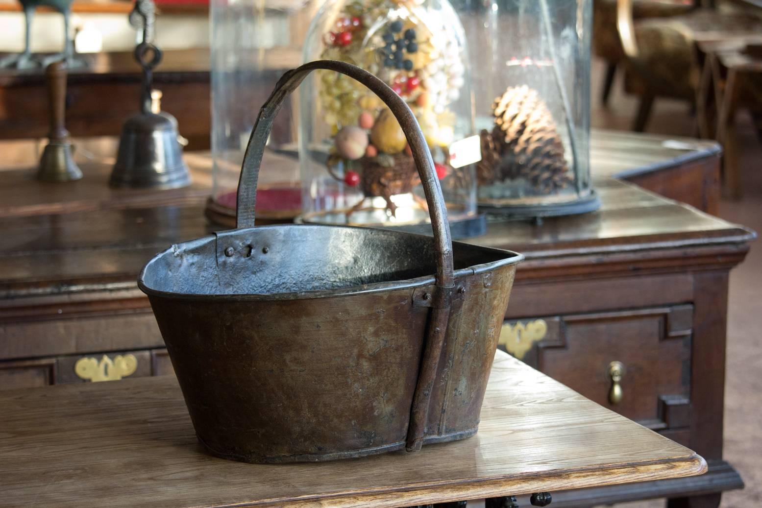 Rare antique French tole potato harvest trug with vine handle, from Burgundy. Beautiful patina that has been waxed.