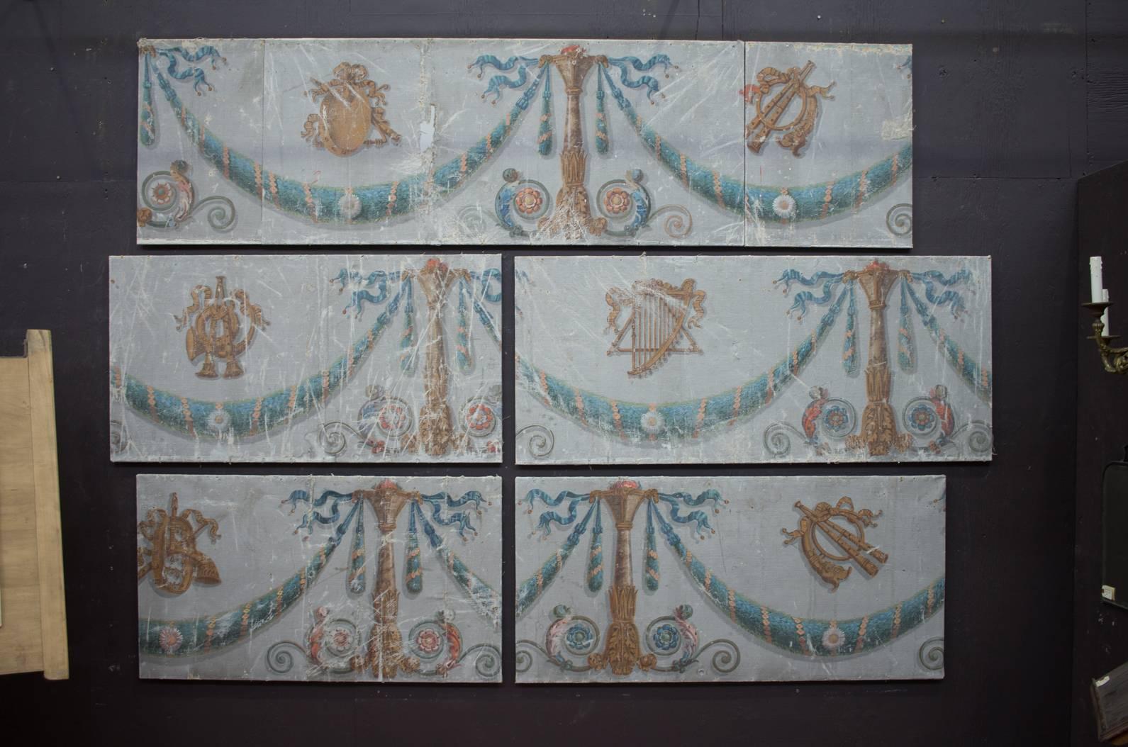 A rare set of seven 18th century Rococo hand-painted French painted canvas panels. 

They likely originated in a theatre as the paintings are adorned with ancient musical instruments including horns and harps. Beautiful muted colors.