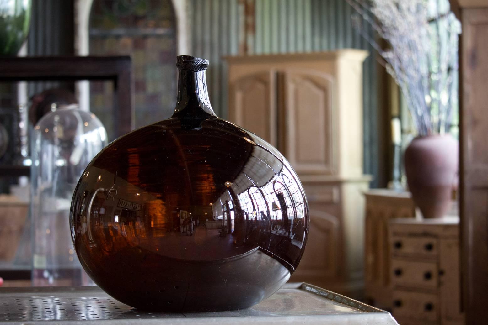 Antique French handblown marron (chestnut) glass wine/spirit keg. We have more available of different sizes. Please contact if you are interested in more than one!