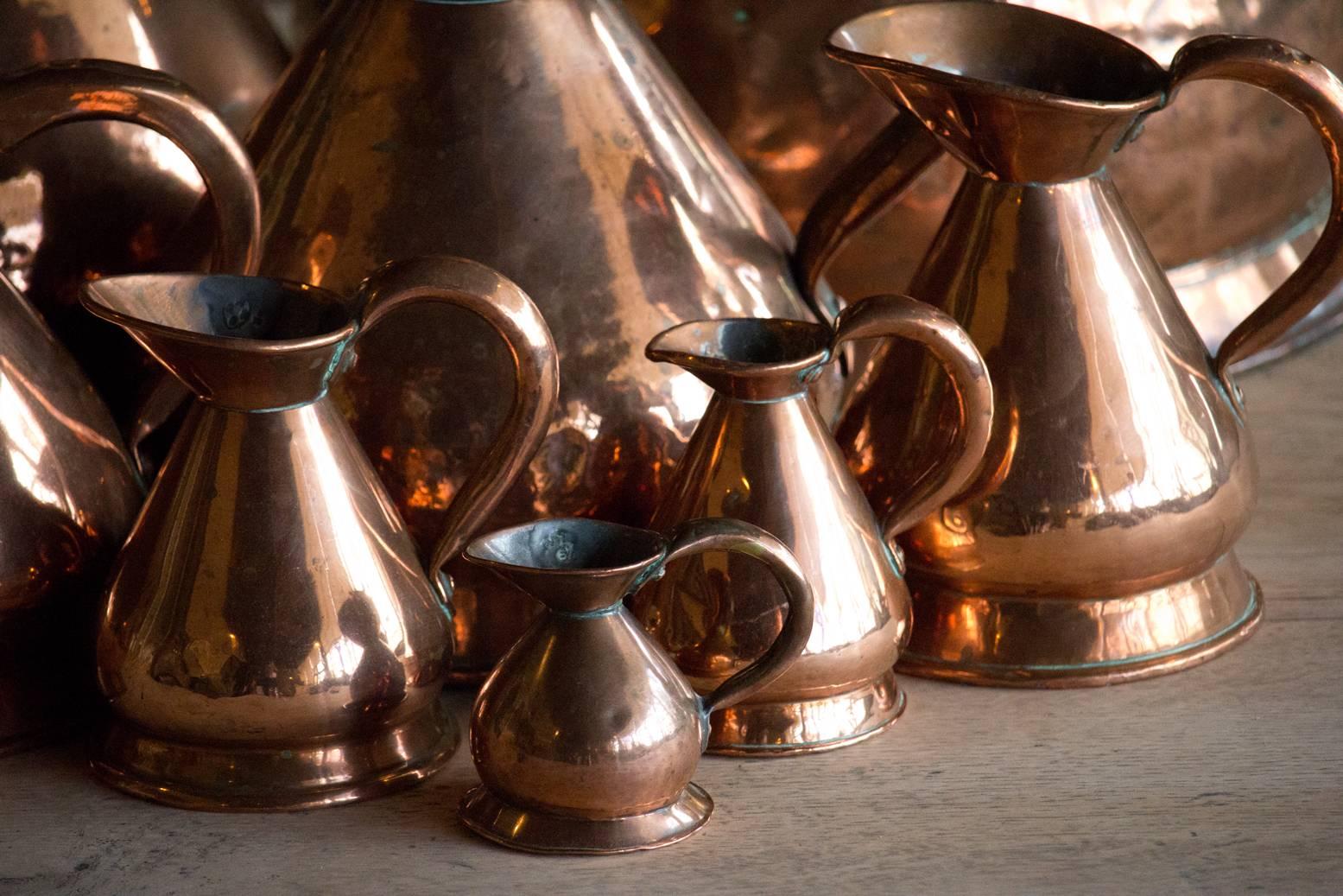 Set of Eight Antique Graduated English Haystack Copper Jugs In Good Condition In Calgary, Alberta