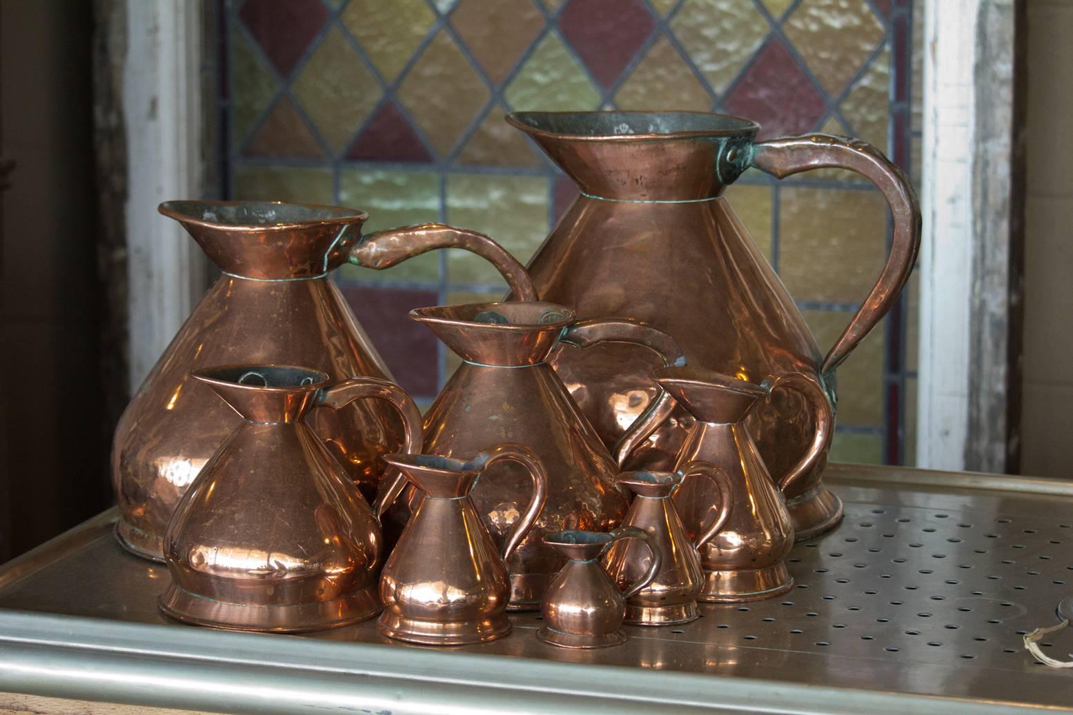 Set of Eight Antique Graduated English Haystack Copper Jugs 5