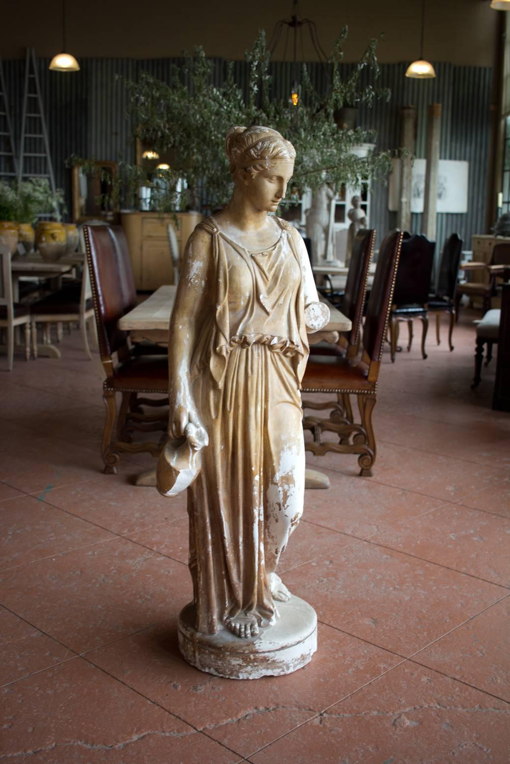 Wonderful antique study in plaster of the beautiful Greek goddess Hebe. Her hand is detached. We liked her without the hand, but we will include it!

She was the goddess of youth and the cupbearer of the gods who served ambrosia at the heavenly