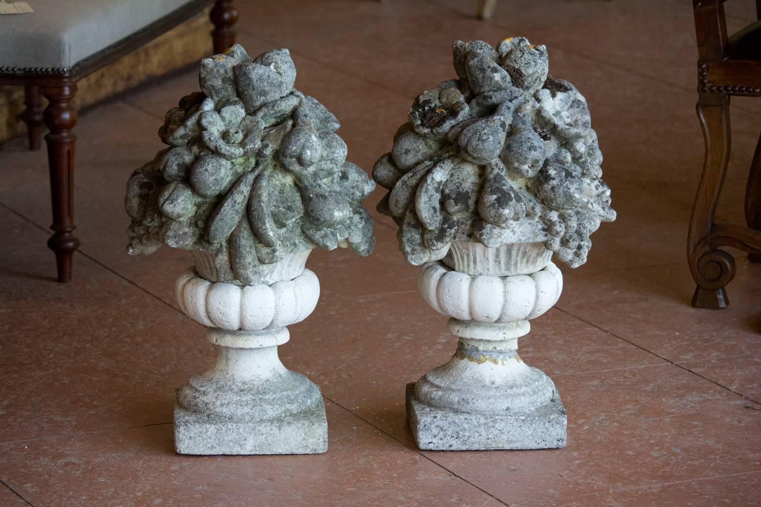 Pair of antique English stone fruit bowl finials with beautiful patina.