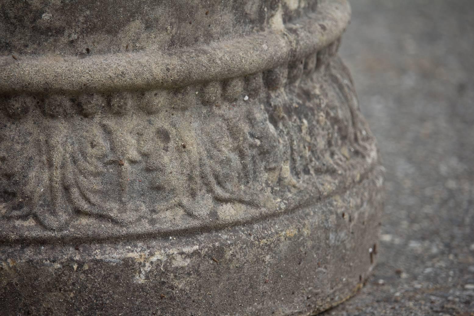 Set of Four Large English Stone Urns on Plinths 1