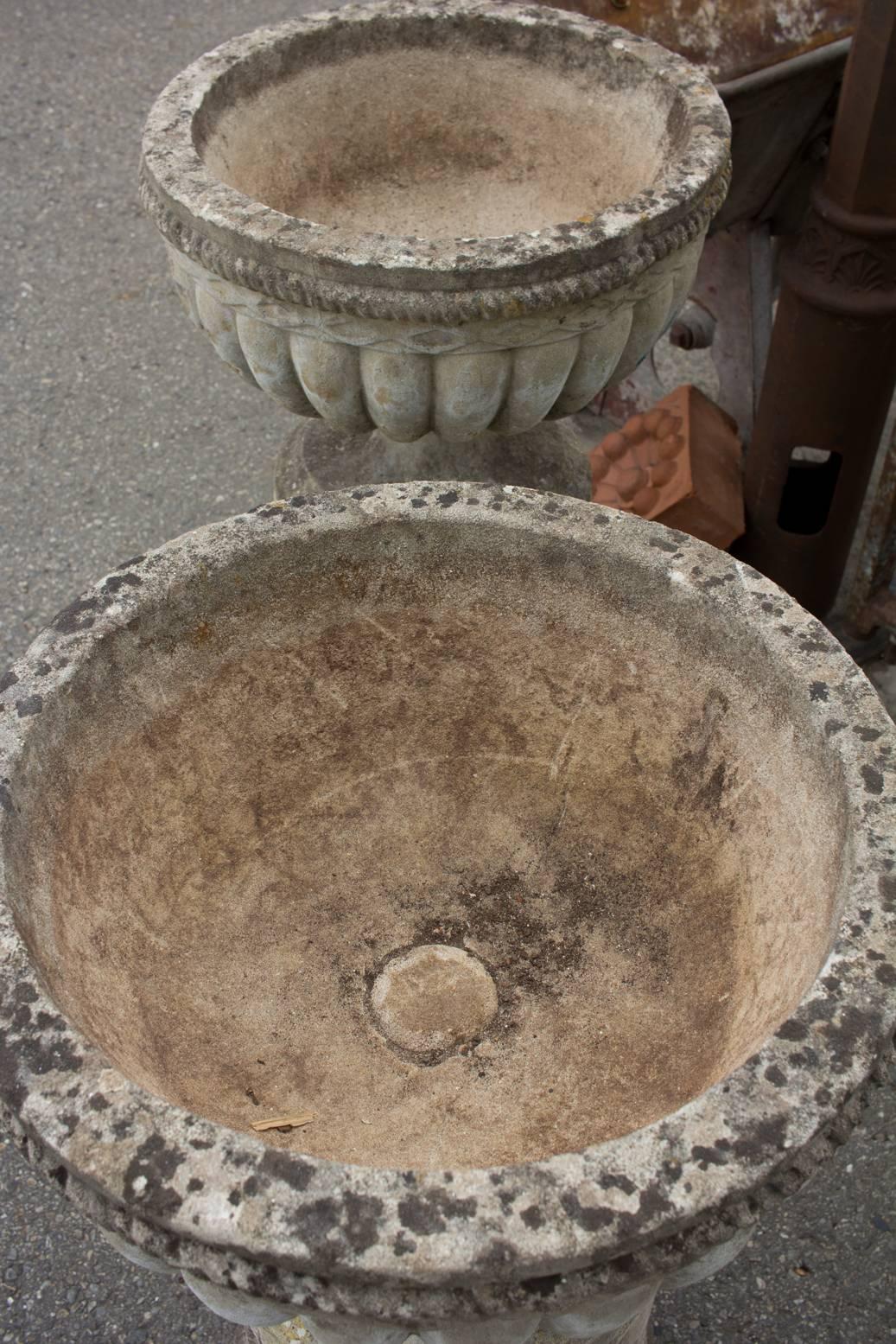 Set of Four Large English Stone Urns on Plinths 3