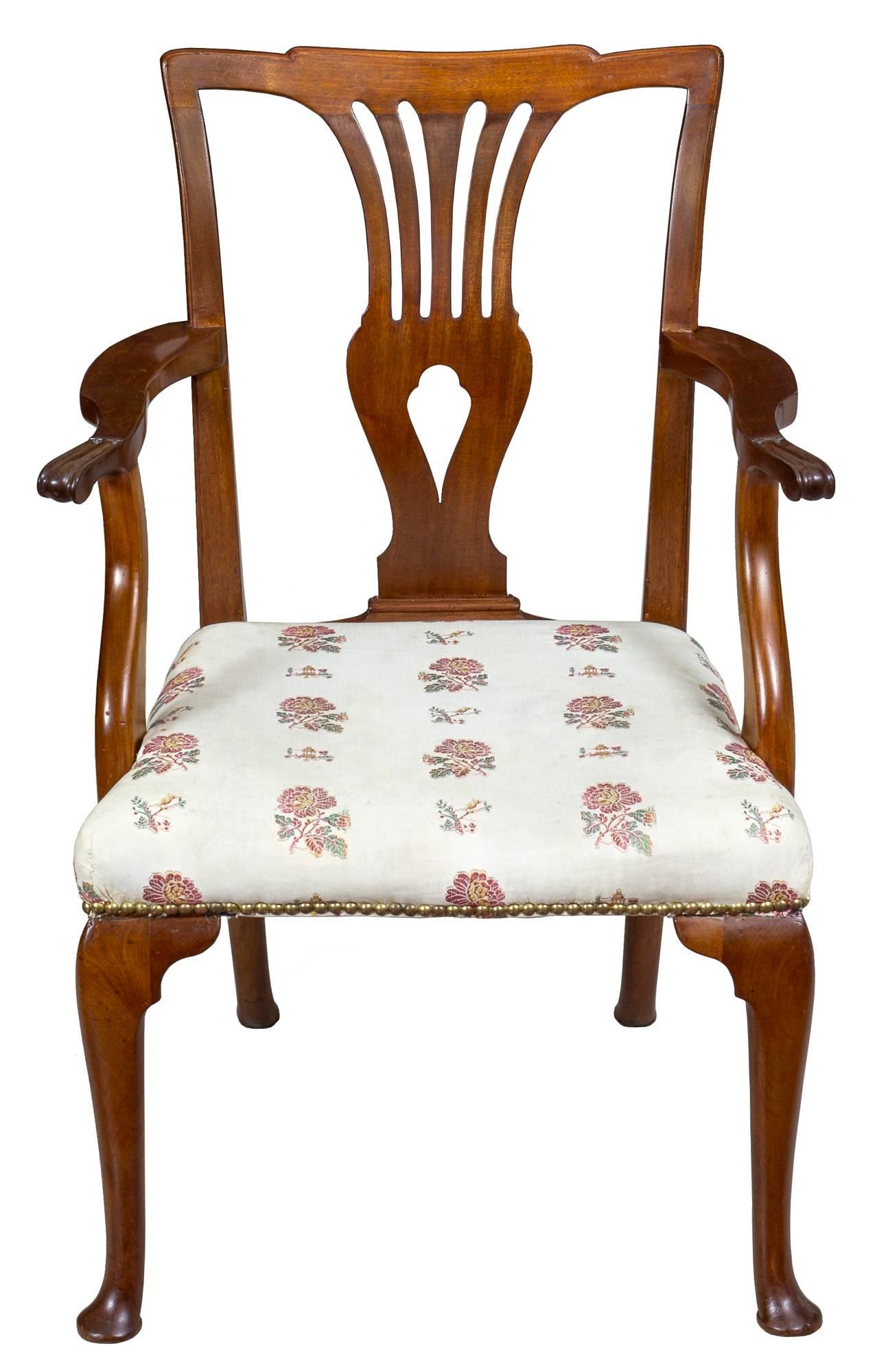 This Queen Anne armchair is supported by well-formed cabriole feet, and note, the rear legs have a desirable stylish camber to them. The legs have had no splices or breaks and are in perfect condition, as is the rest of the chair. The arms are