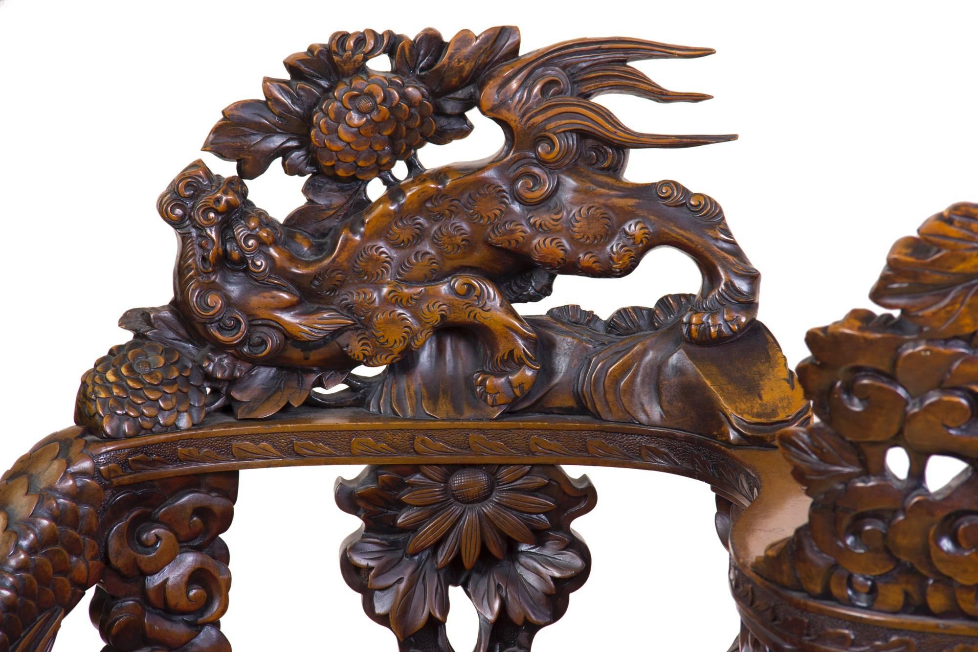 The tête-à-tête form appears in the latter part of the 19th century, a Victorian motif that here is expressed in the Japanese style, and of Japanese workmanship.

This tête-à-tête is a tour de force of the best carving, that is fully developed
