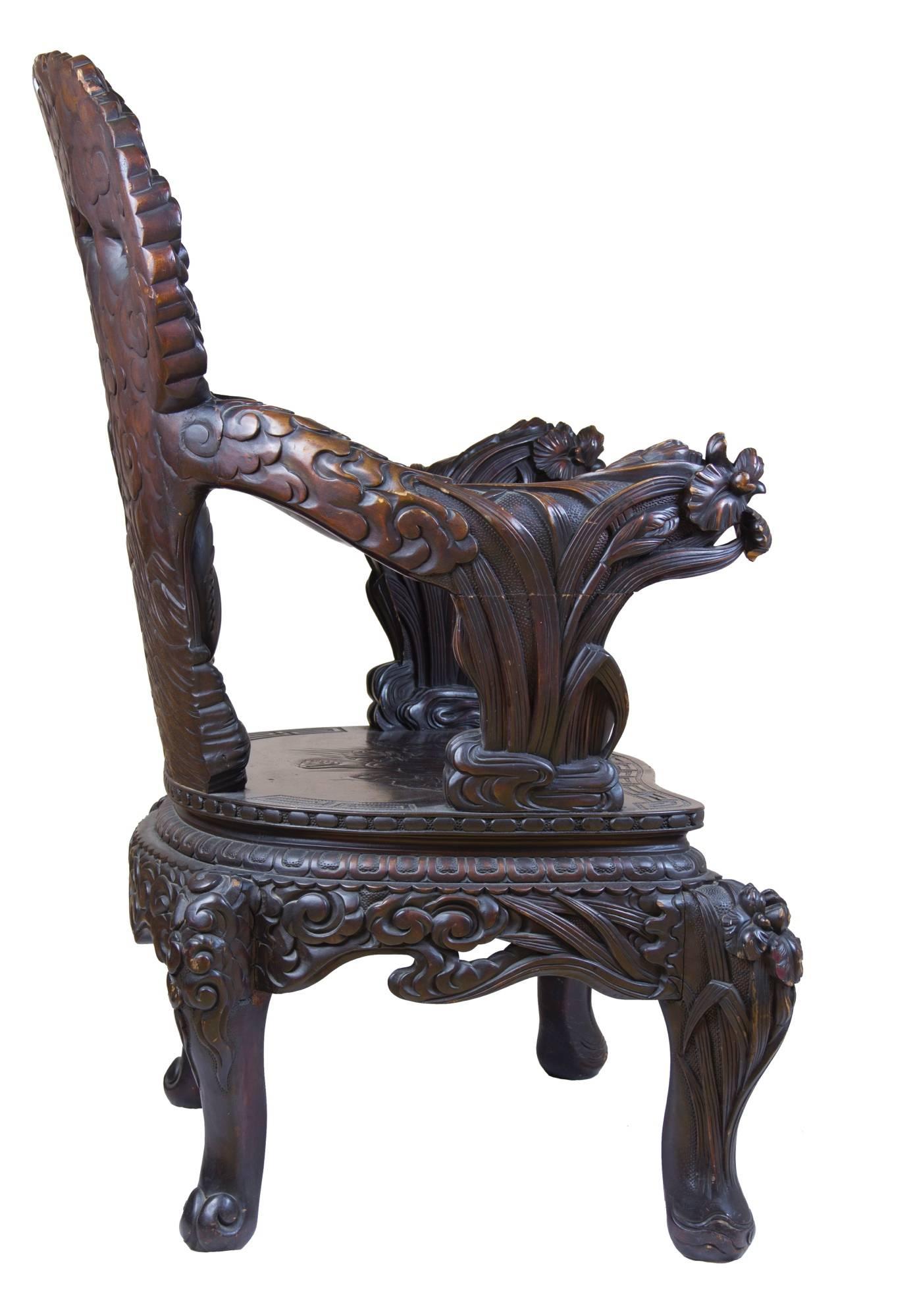 Chinese Export Exuberant Wood Armchair with Bird Motif and Floral Carving, Late 19th Century For Sale