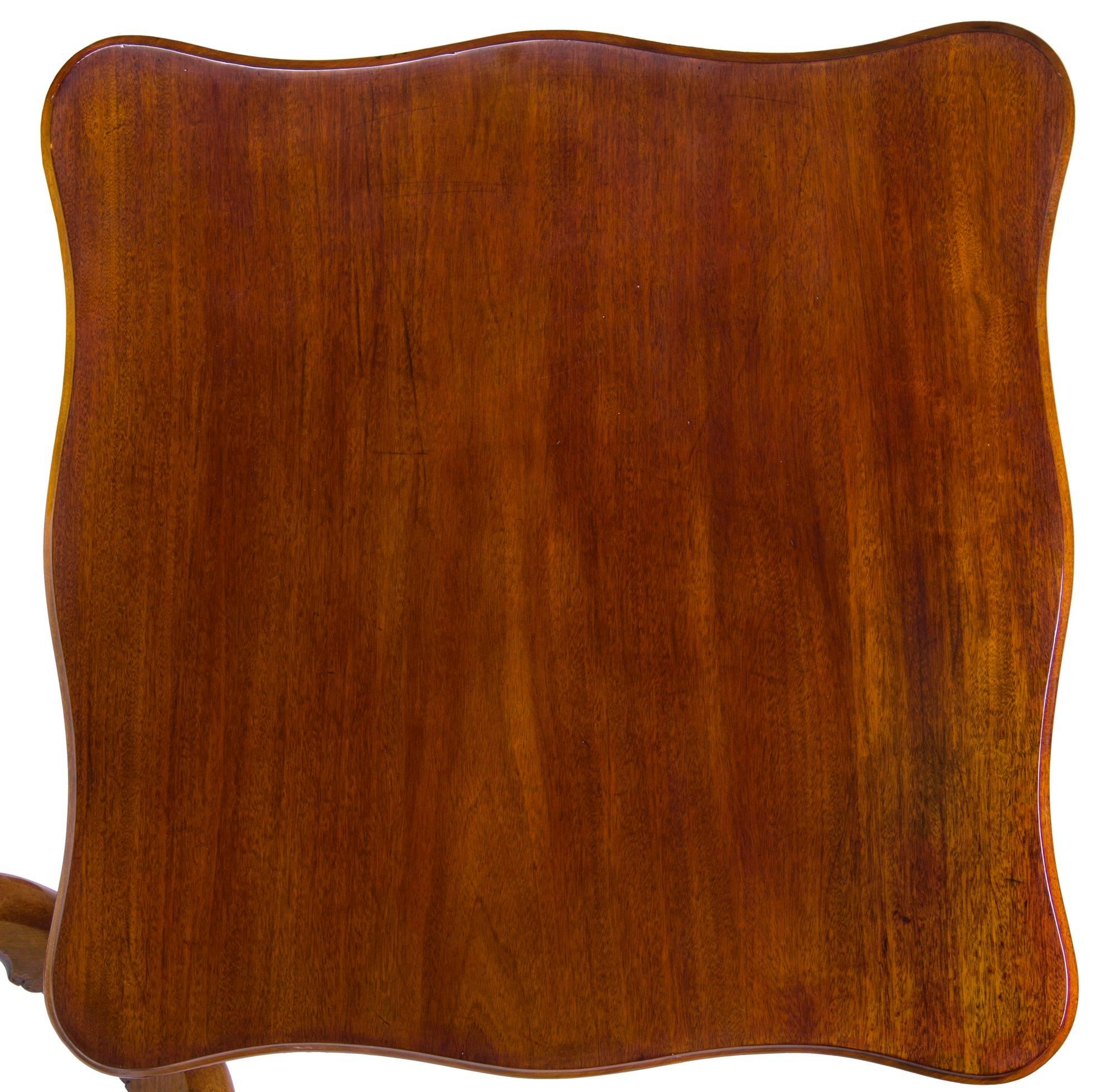 Colonial tilt-top tables, tended, as a rule, to be round. These were also produced in a square form, of which some, like this example, had serpentine edged 
