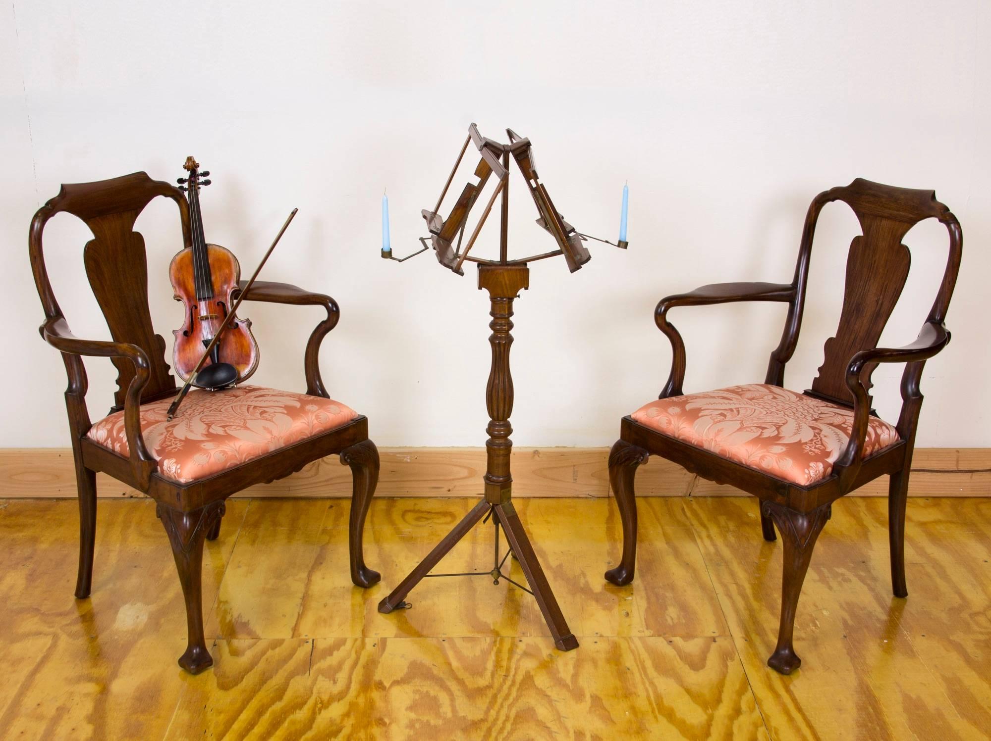 This has got to be the ultimate in a portable music stand. Note how it collapses to a single large baluster pole. It's an economy of space that's built like a watch. A review of the detailed images will show that the integration of carved elements