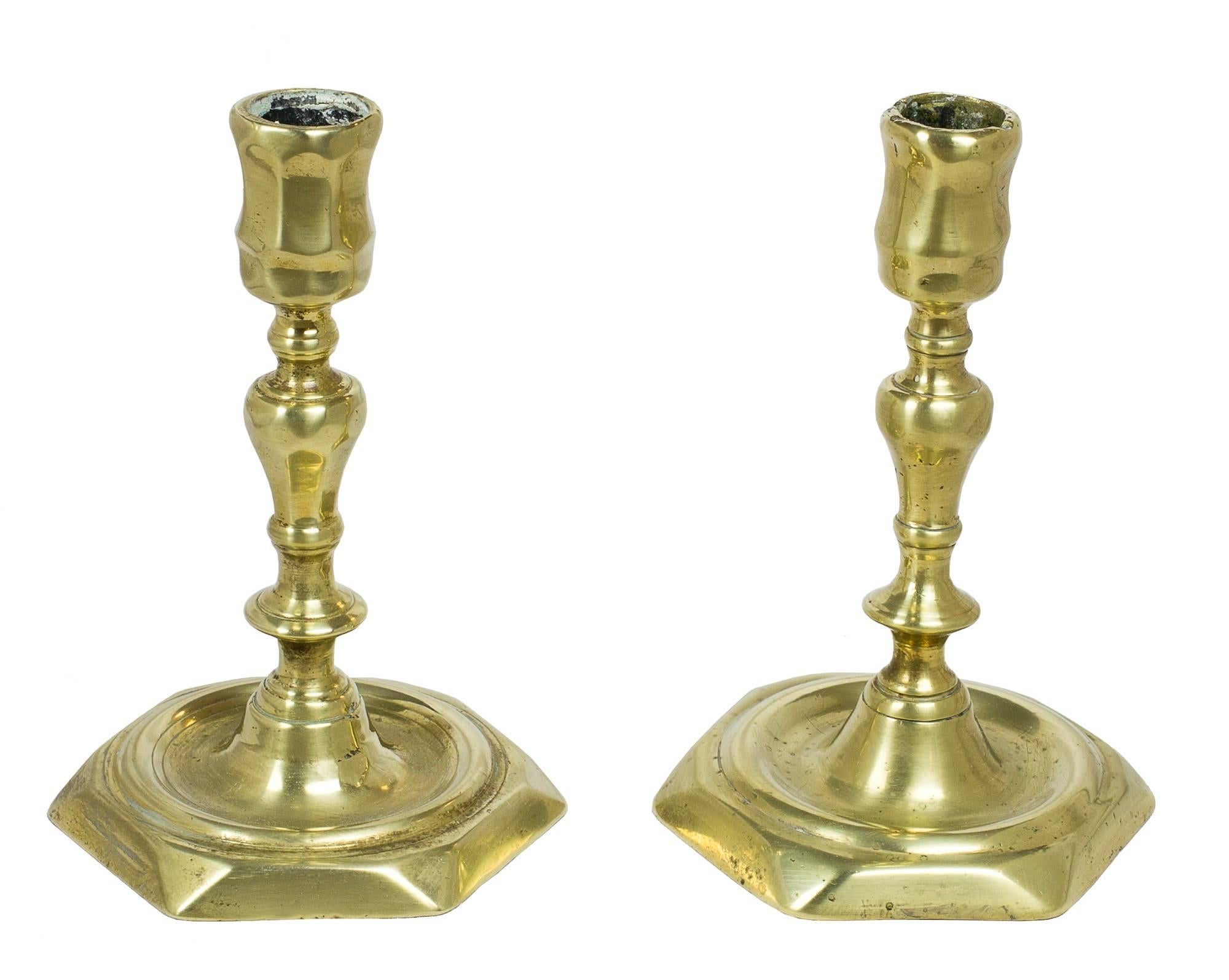 A pair of Northern European brass candlesticks, probably Danish, circa 1740.