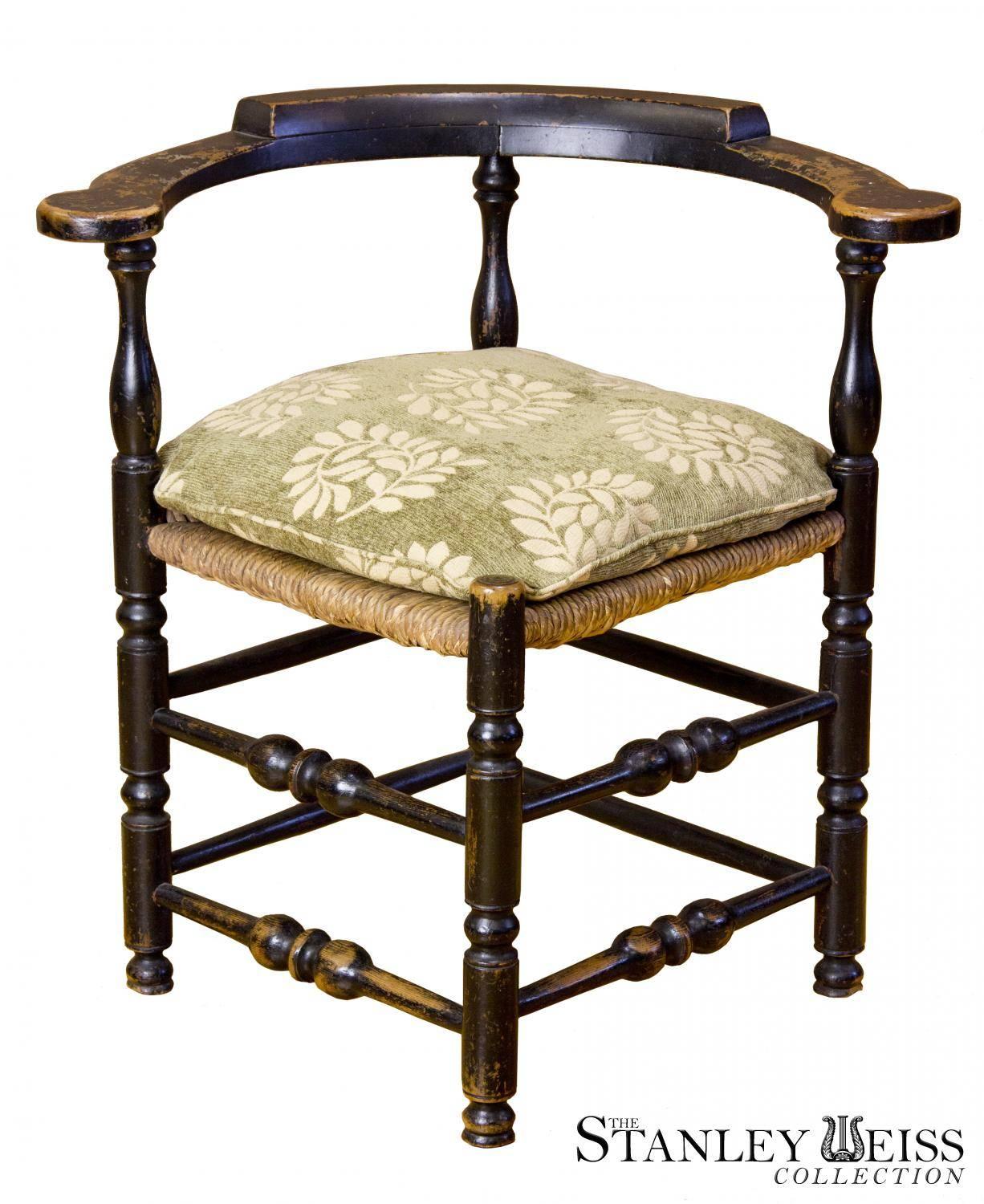 Corner chairs exist to be found but special ones in fine condition with an older surface such as this are rarities.  What draws one to this piece are the cross stretchers which have double sets of turnings on each side.   A related armchair in our