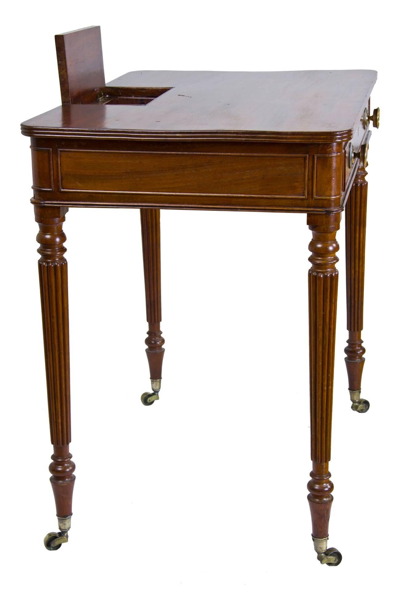 Regency Late Sheraton Mahogany Chamber Writing-Table, England, circa 1810 For Sale