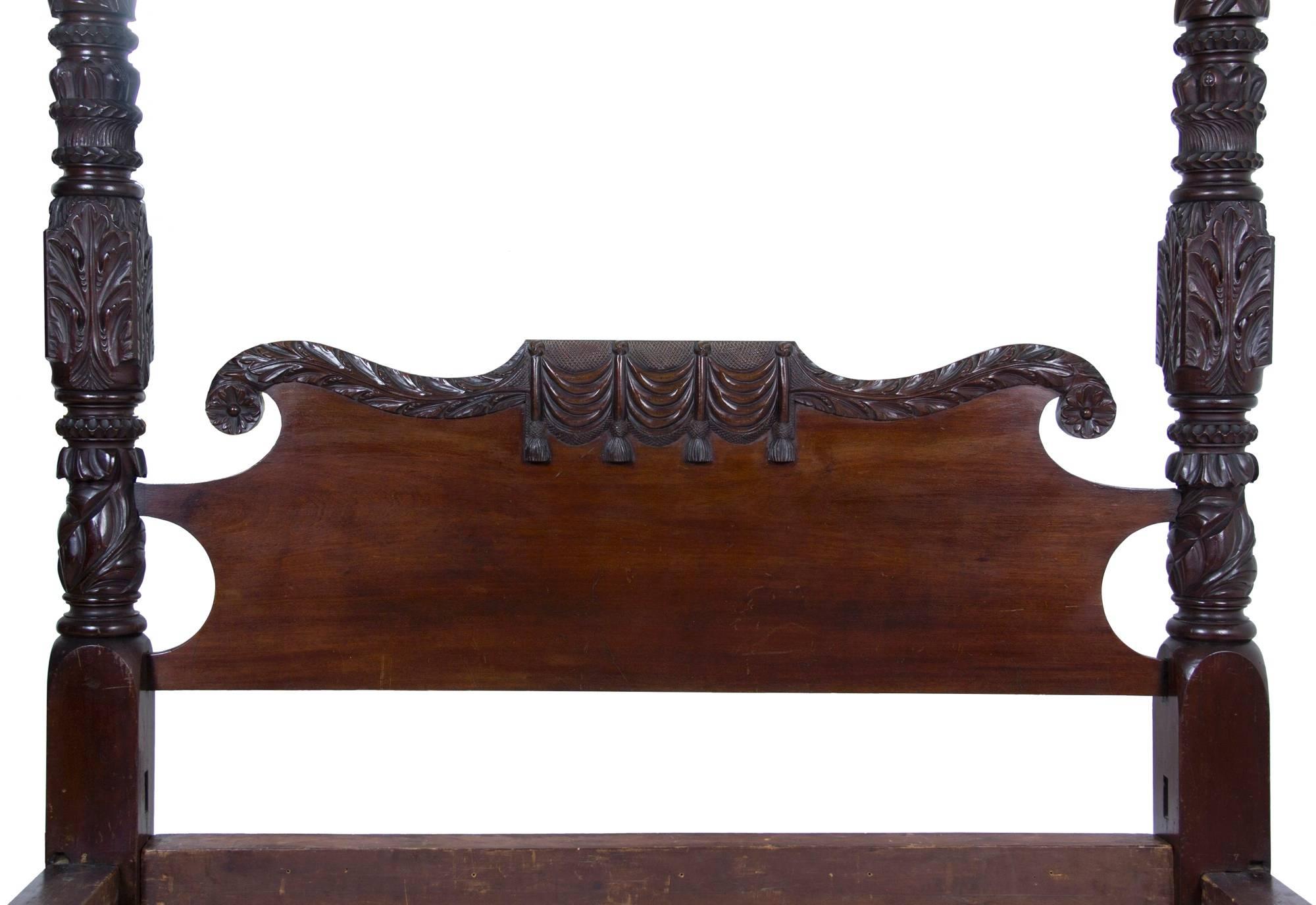 Provenance: Ansel Gibbs (b.1773 - d.1835) of Fairhaven, MA: Shipmaster, Merchant and Justice of the Peace.
Deaccessioned from New Bedford Whaling Museum.

This bed is composed of heavy, dense mahogany, profusely carved on all posts, terminating