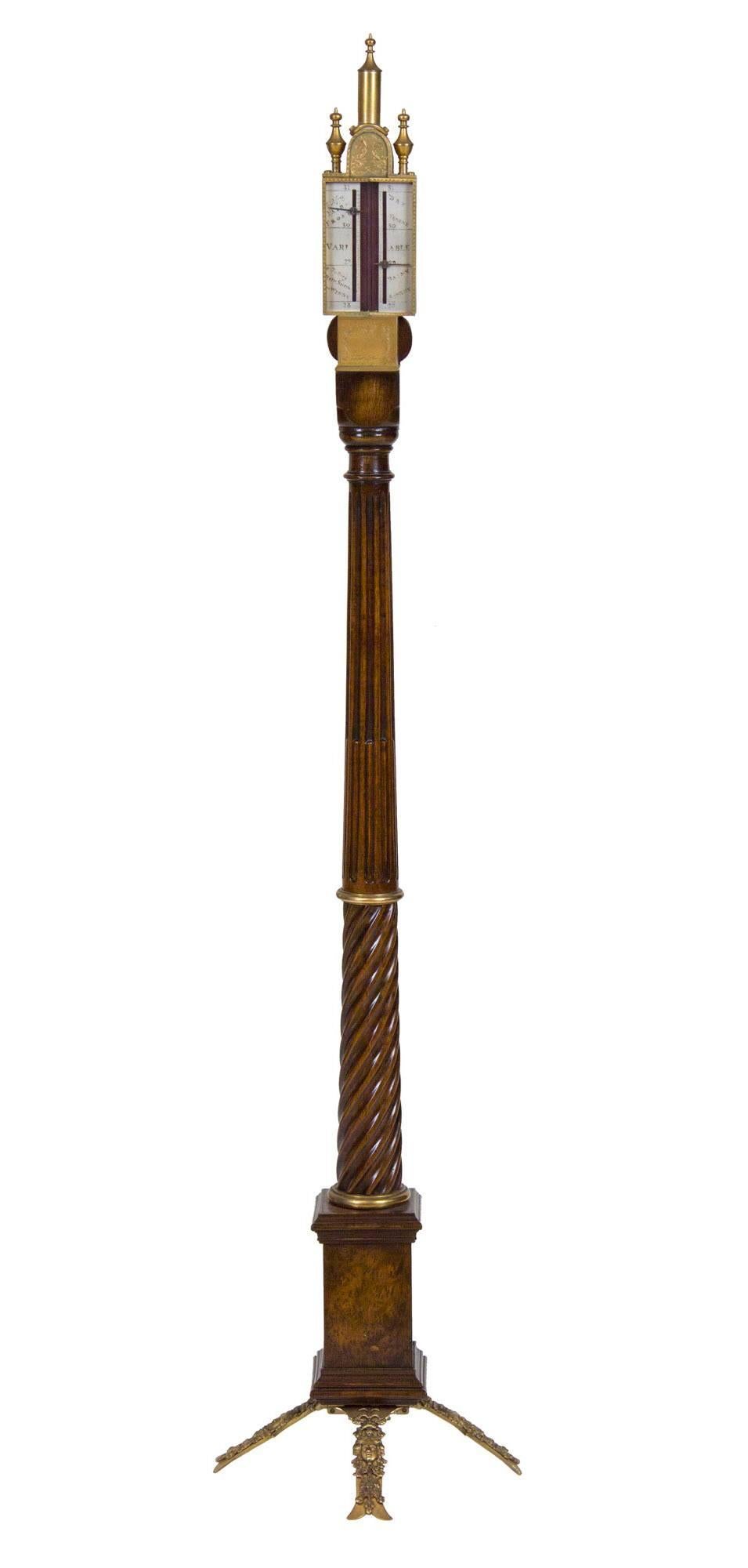 This is a finely crafted piece composed of the best walnut. These replicas surface from time to time, and all details are finely executed in this example. The carving along the neck is first rate, with a large conical section of deep, fluted reeds