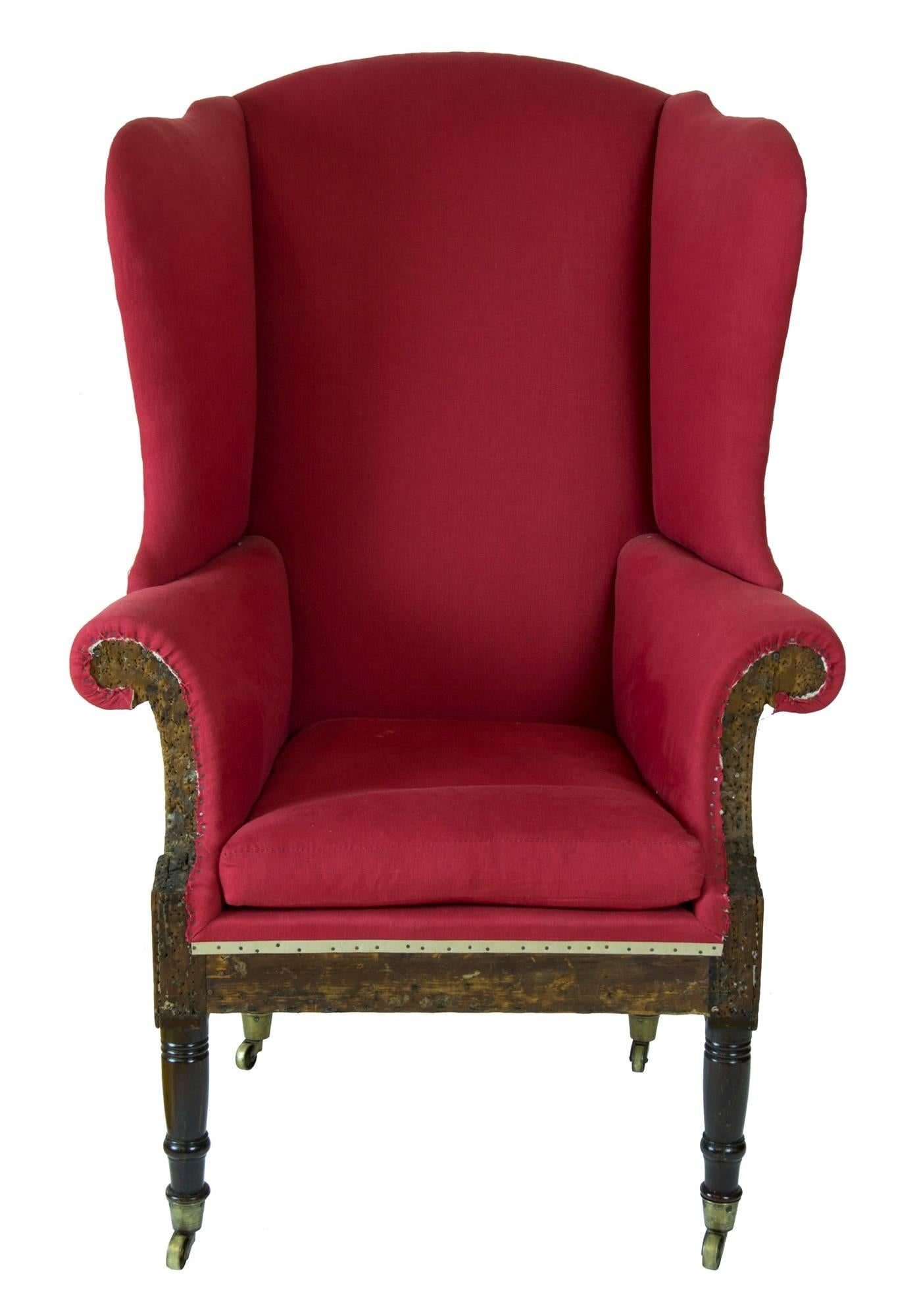 This wing chair is a little gem, as pure as they get, and we show it with the essential upholstery revealing the condition of the structure. It has museum numbers (possibly Mt. Vernon) and probably used for exhibition. 

It retains a most